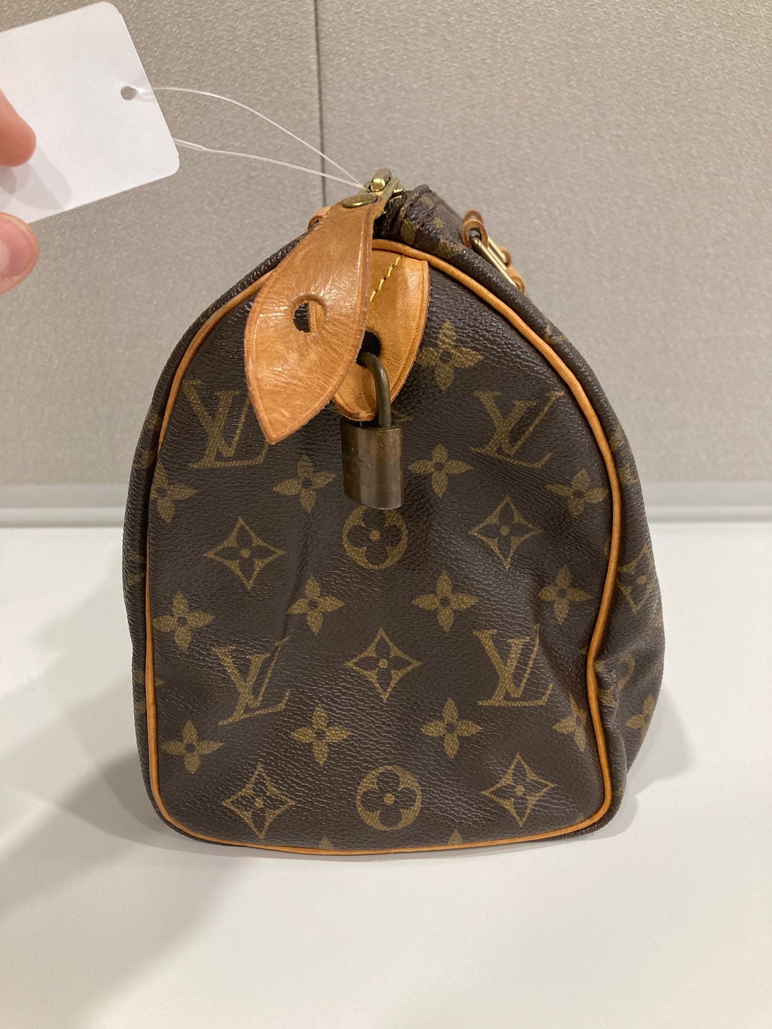 Louis Vuitton Speedy 25 Monogram con bandolera extra