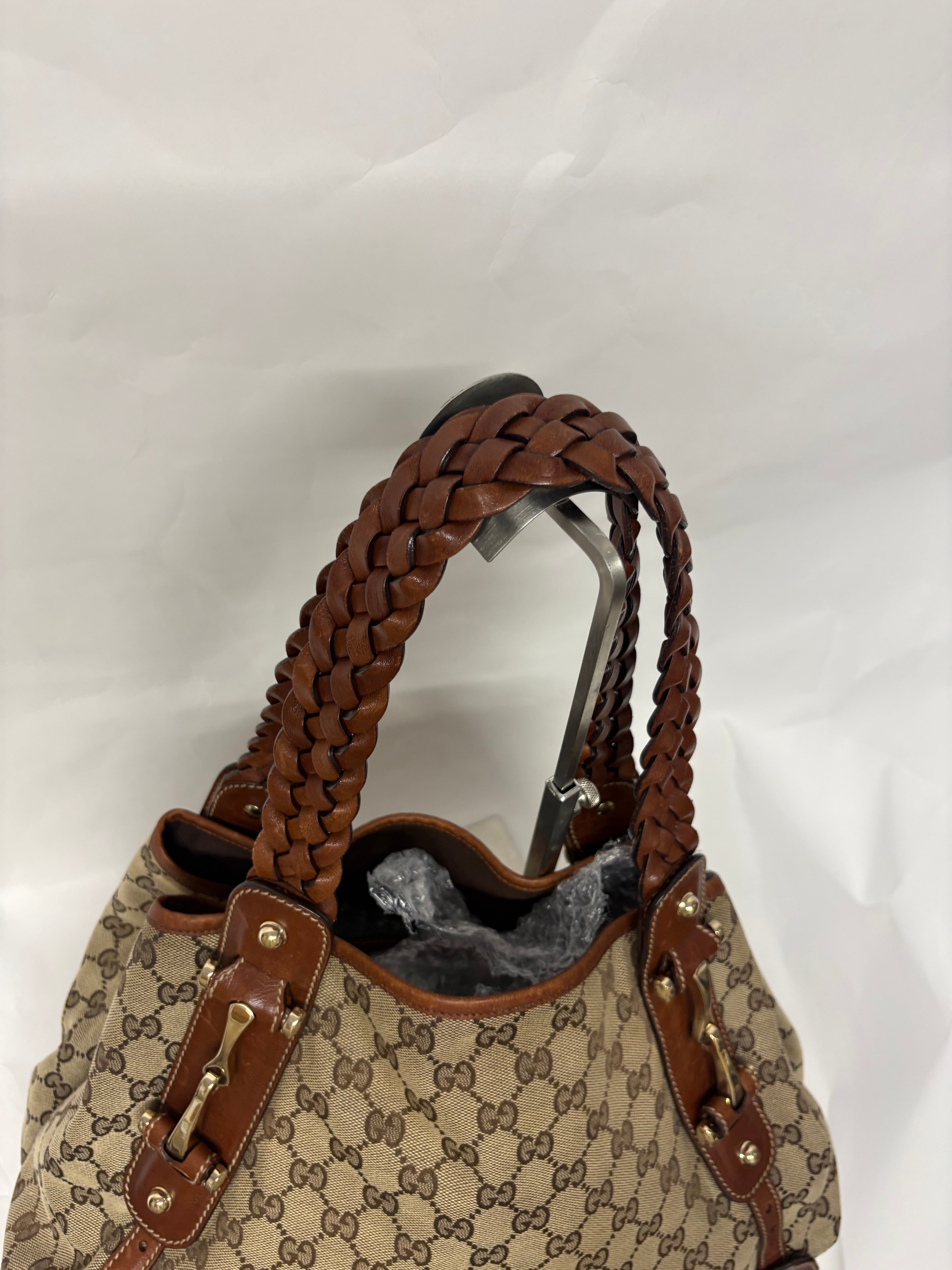 Gucci Pelham clásico en lona GG beige con piel marrón y asas trenzadas mediano