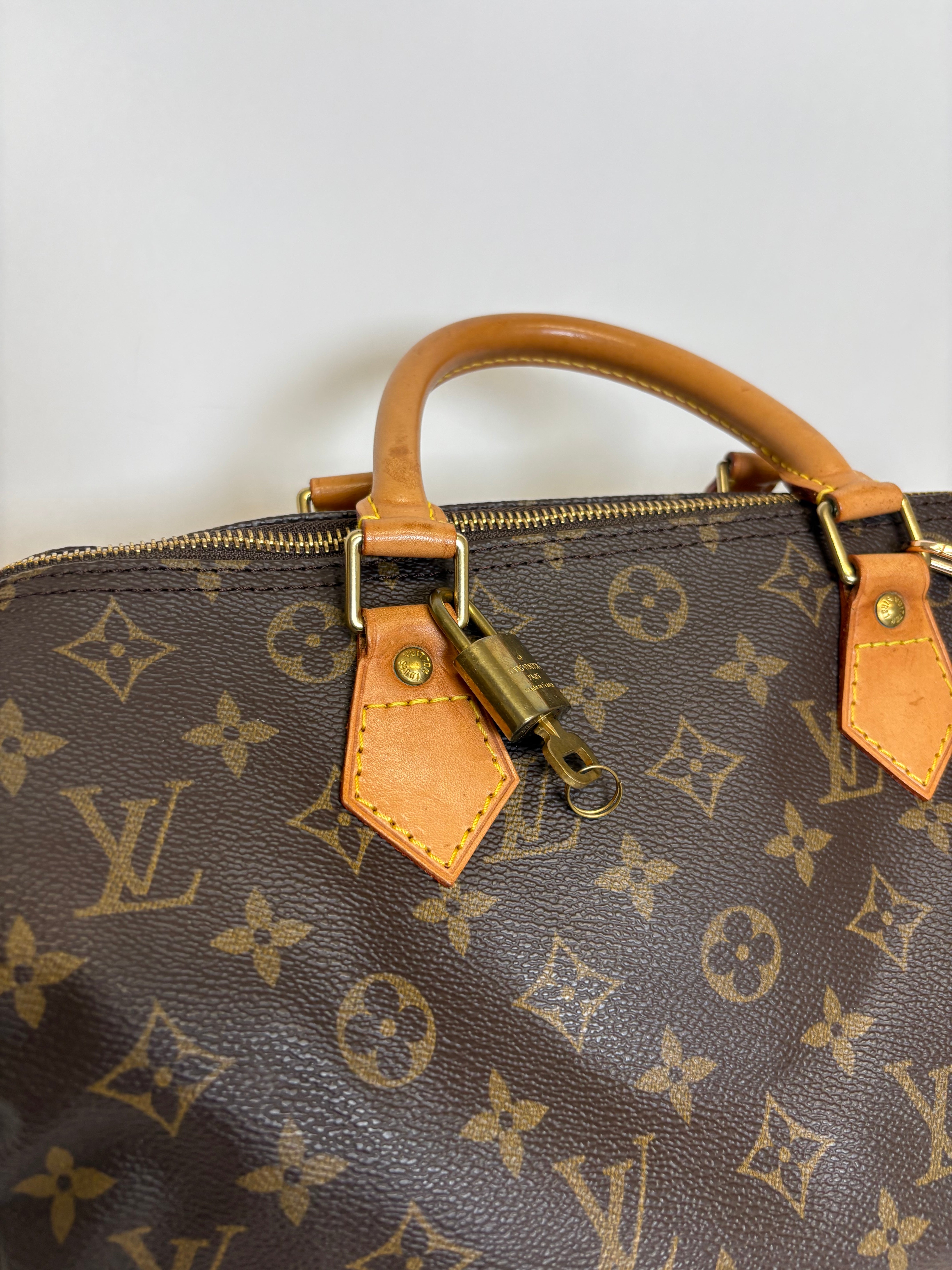 Speedy 30 canvas monogram con bandolera extra