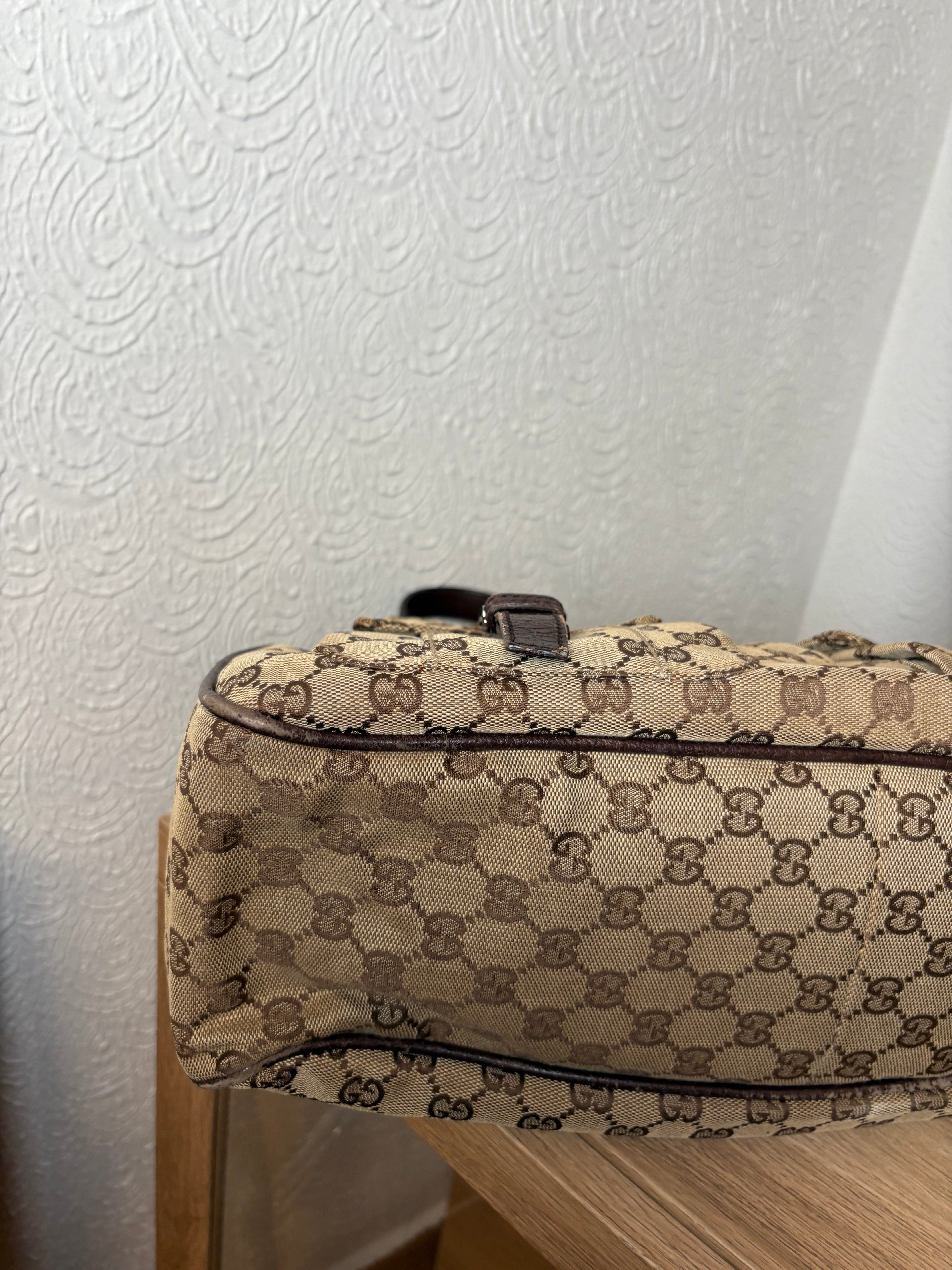GUCCI Bolso de hombro GG Canvas con bolsillos frontales