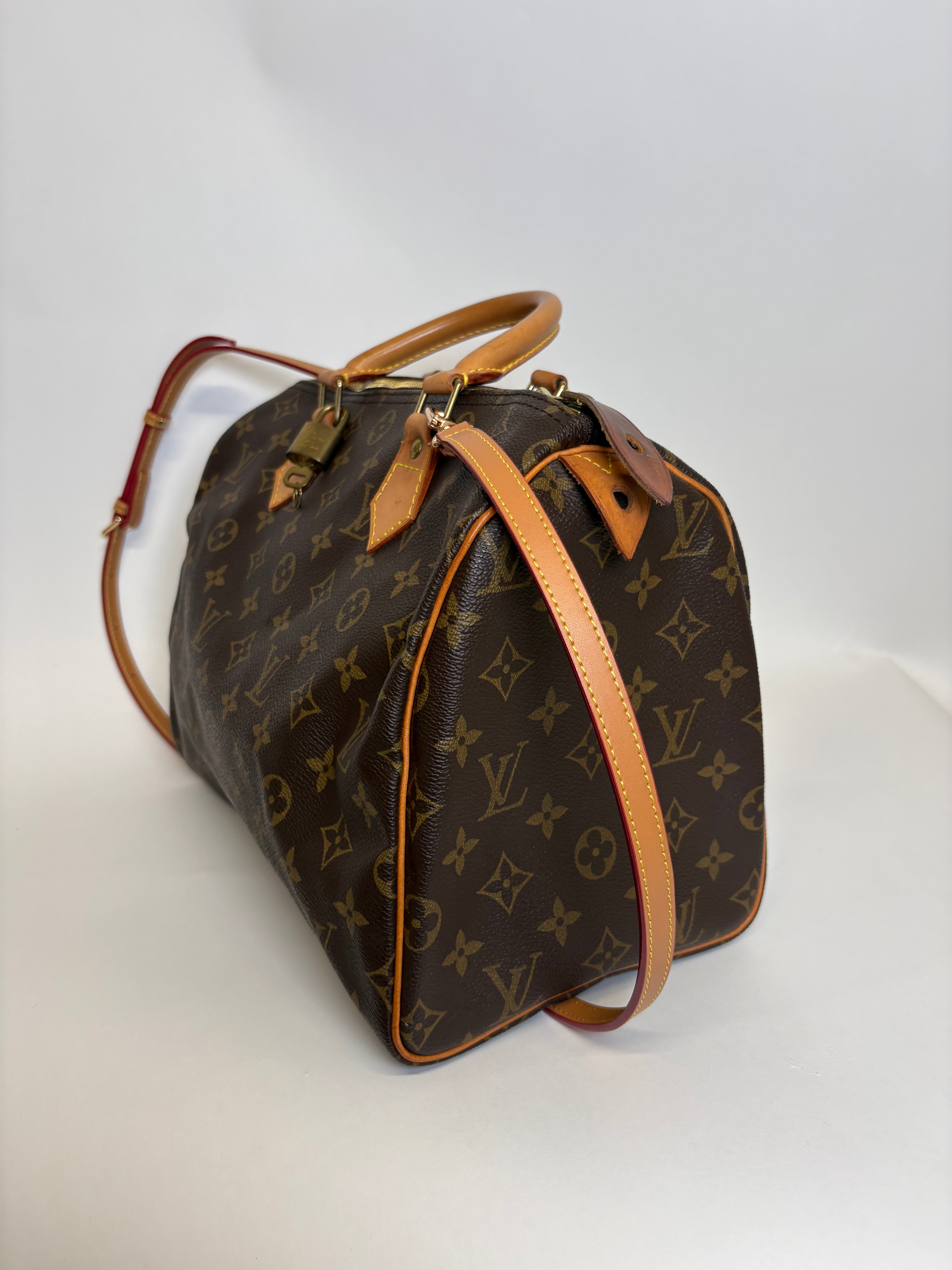 Speedy 30 canvas monogram con bandolera extra