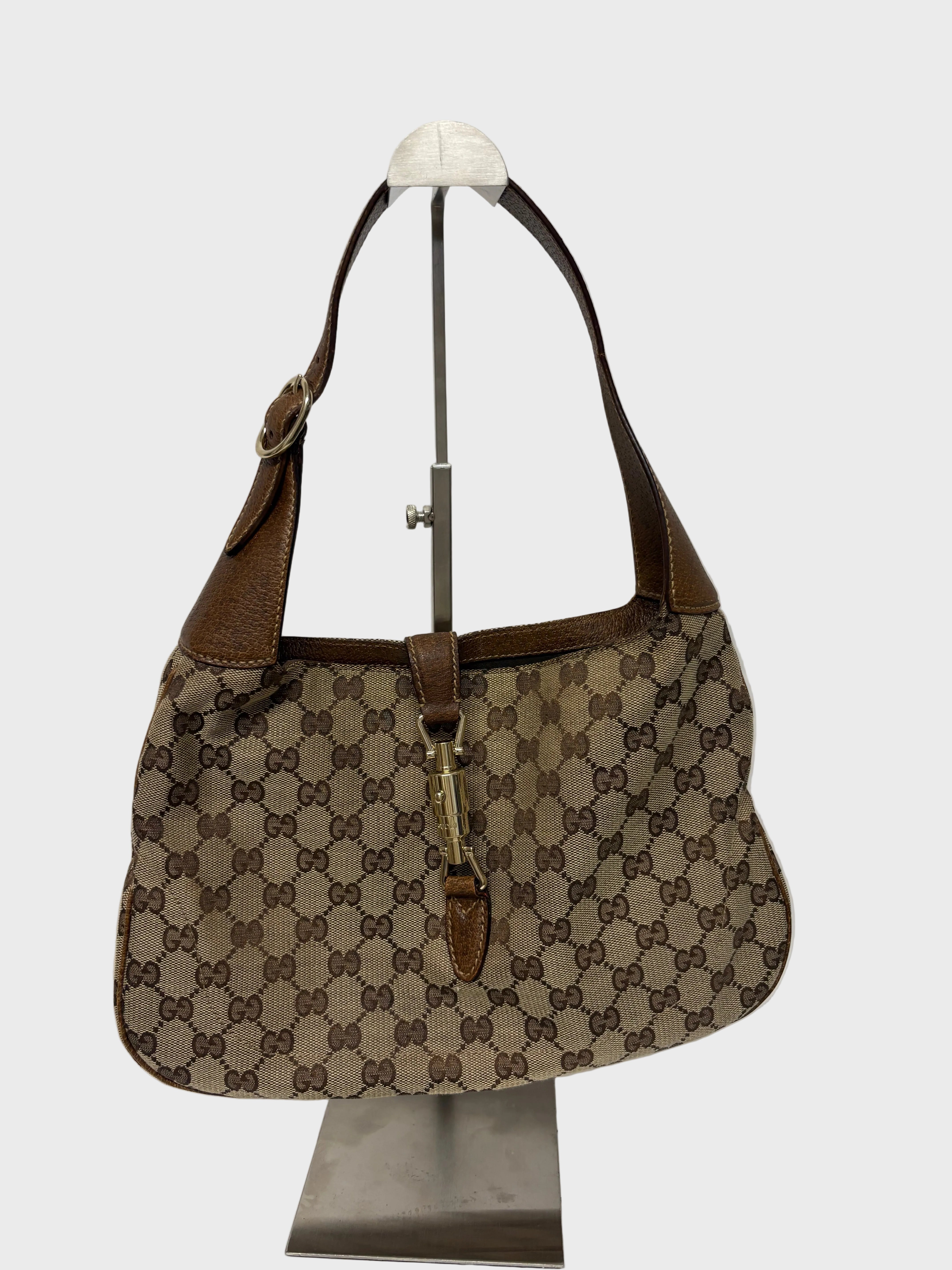 Gucci Jackie clásica GG canvas marrón con cierre pistón dorado