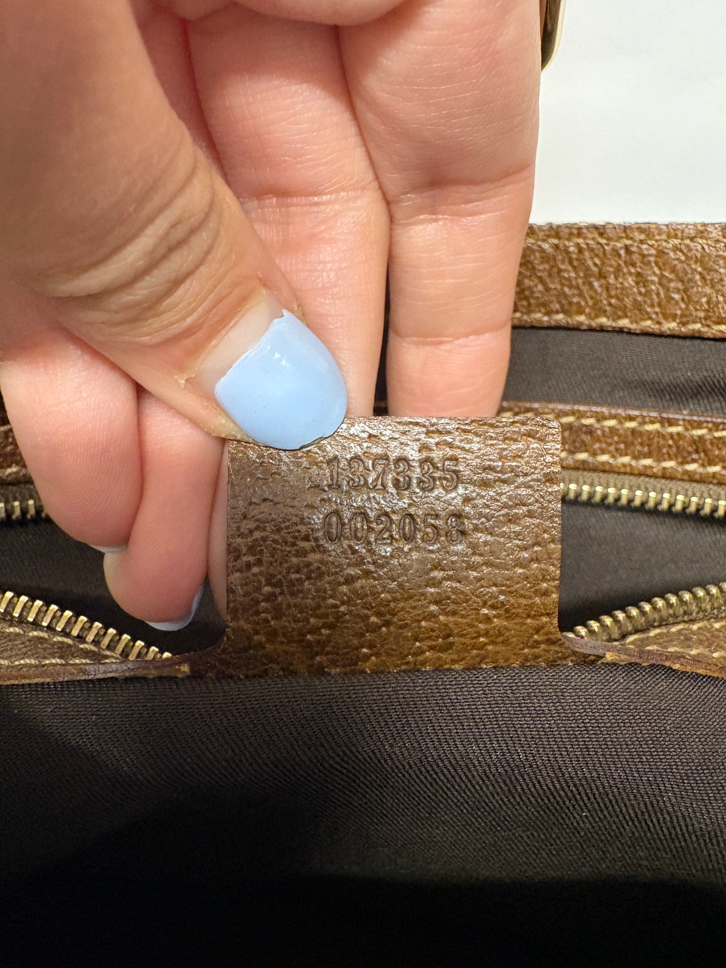 Gucci Jackie clásica GG canvas marrón con cierre pistón dorado