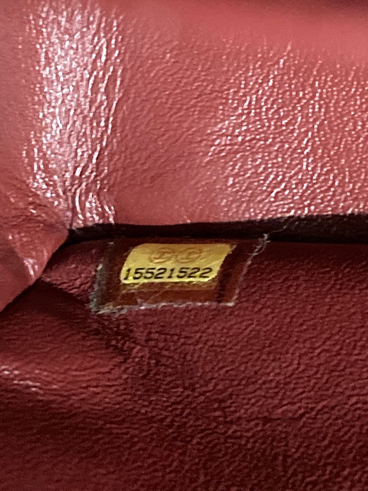 Chanel Clásico Doble Solapa 34 en piel caviar burdeos y herrajes plateados