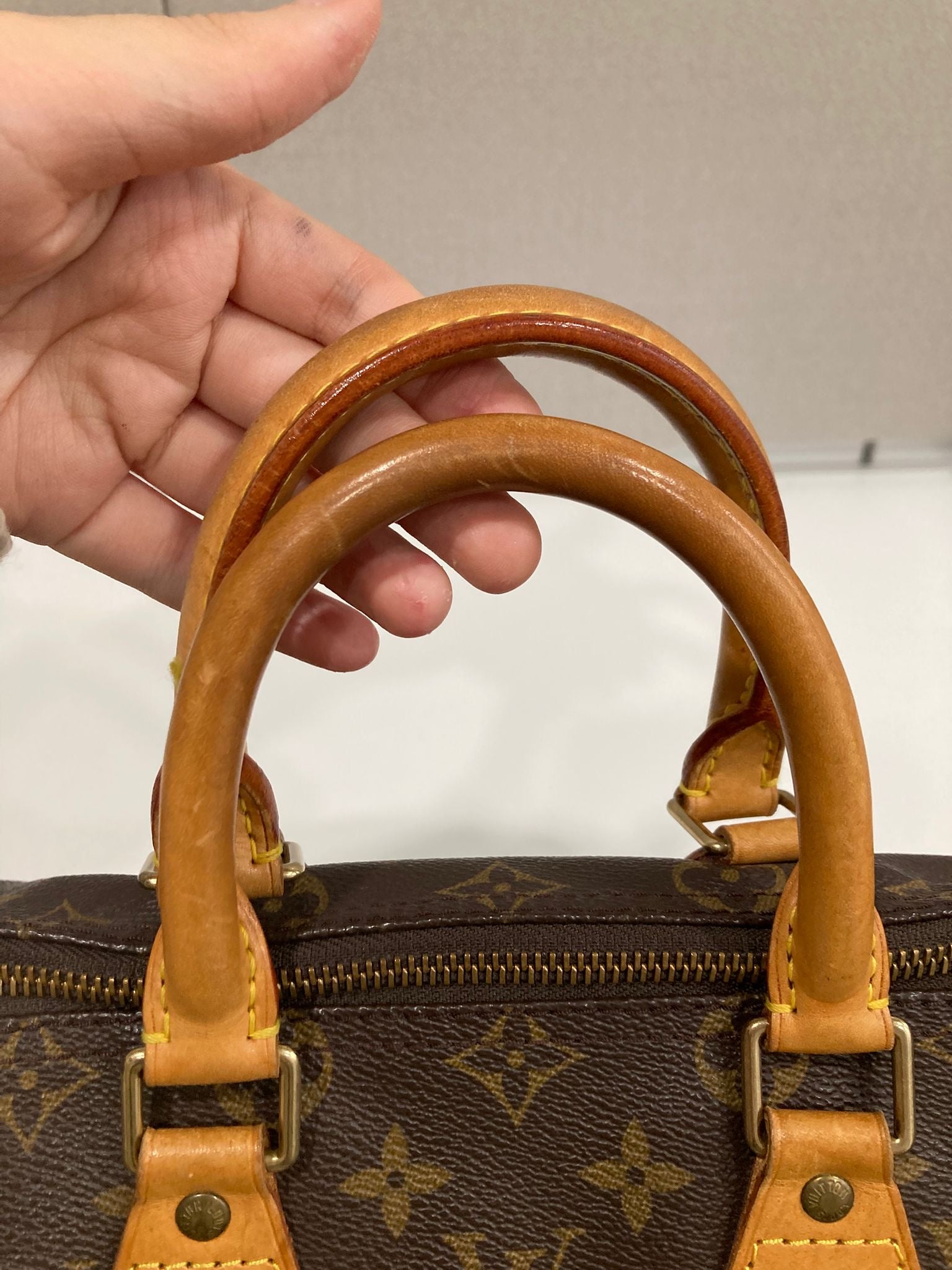 Louis Vuitton Speedy 25 Monogram con bandolera extra