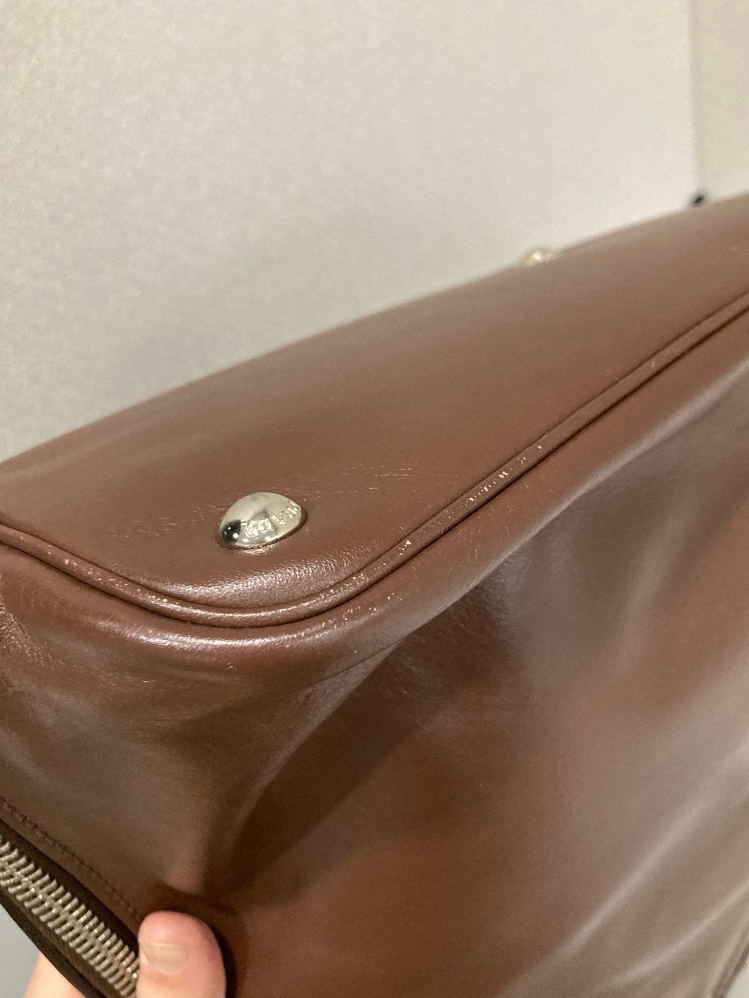Prada Bauletto 2Way en piel marrón con bandolera