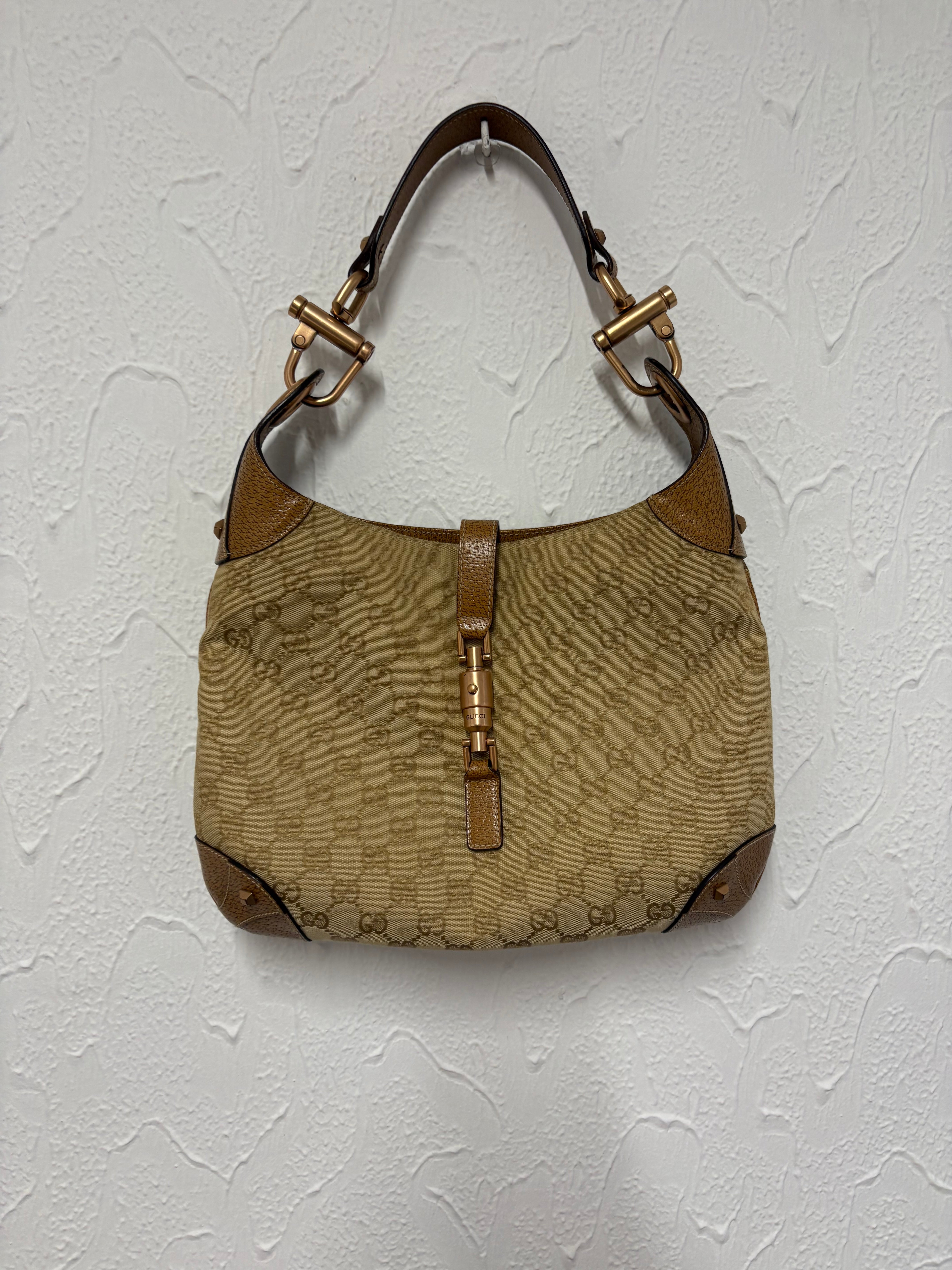 Gucci jackie gg canvas gold rosado y marron