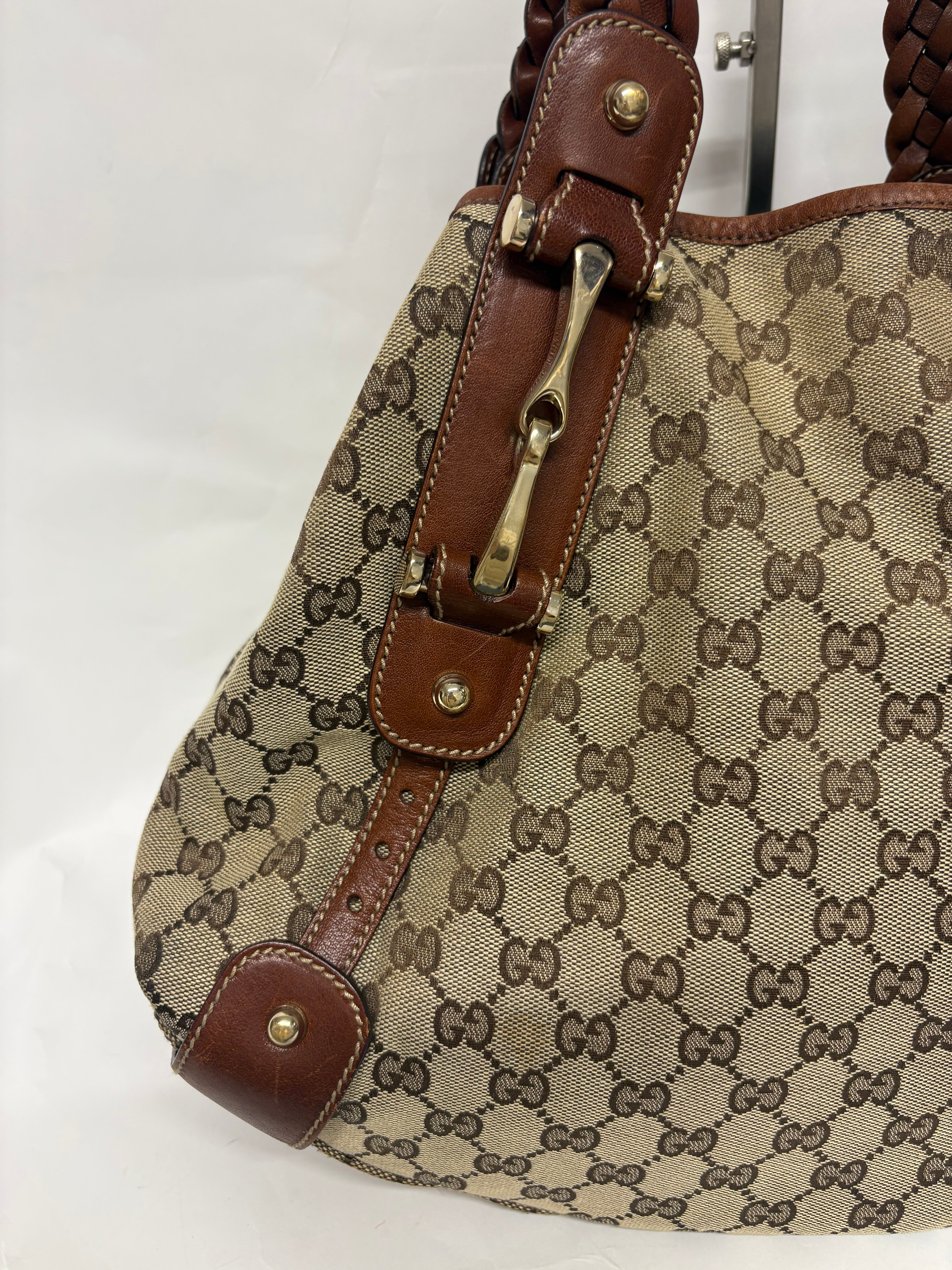Gucci Pelham clásico en lona GG beige con piel marrón y asas trenzadas mediano