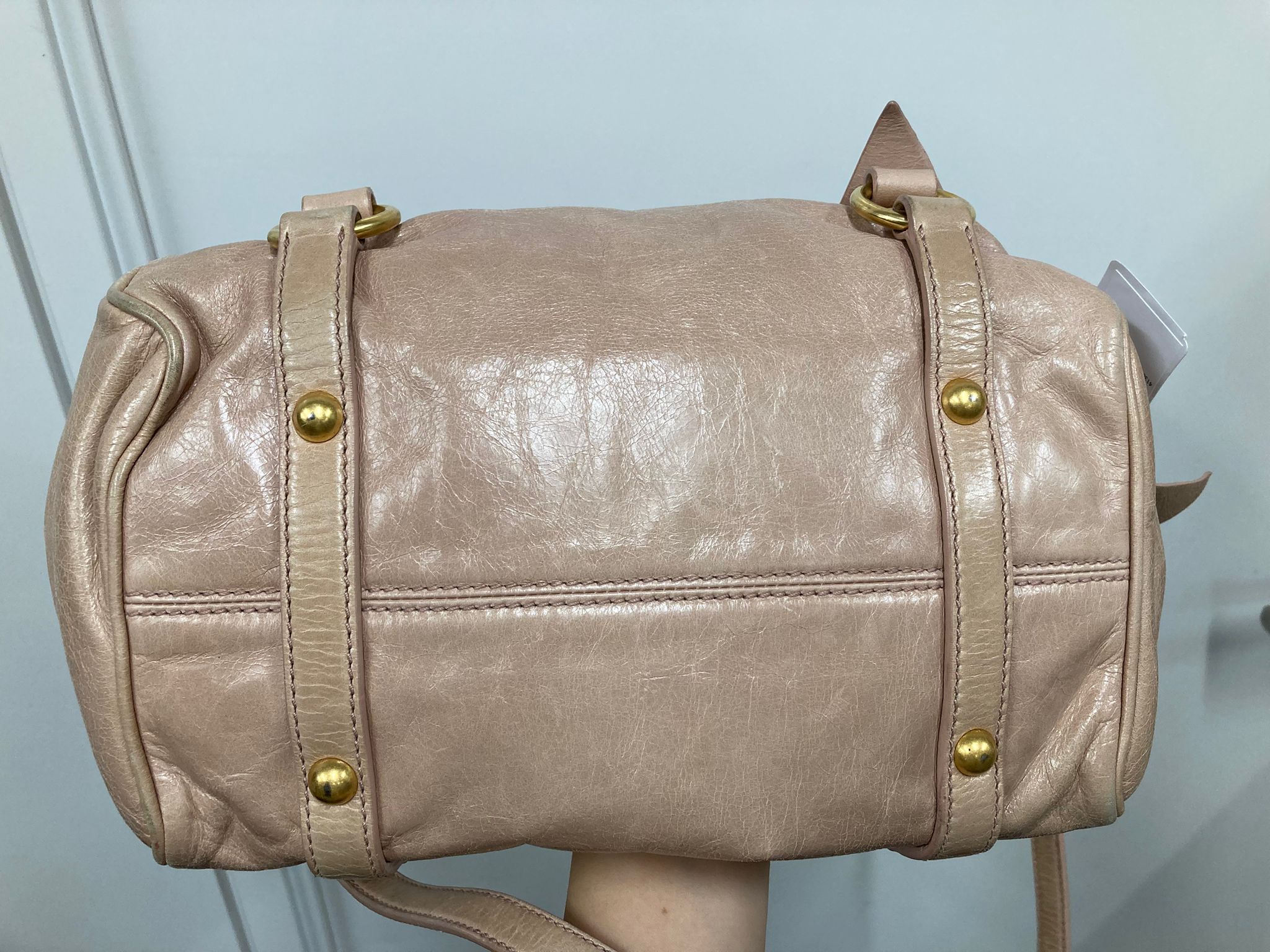 Miu Miu Vitello small rosa claro con bandolera