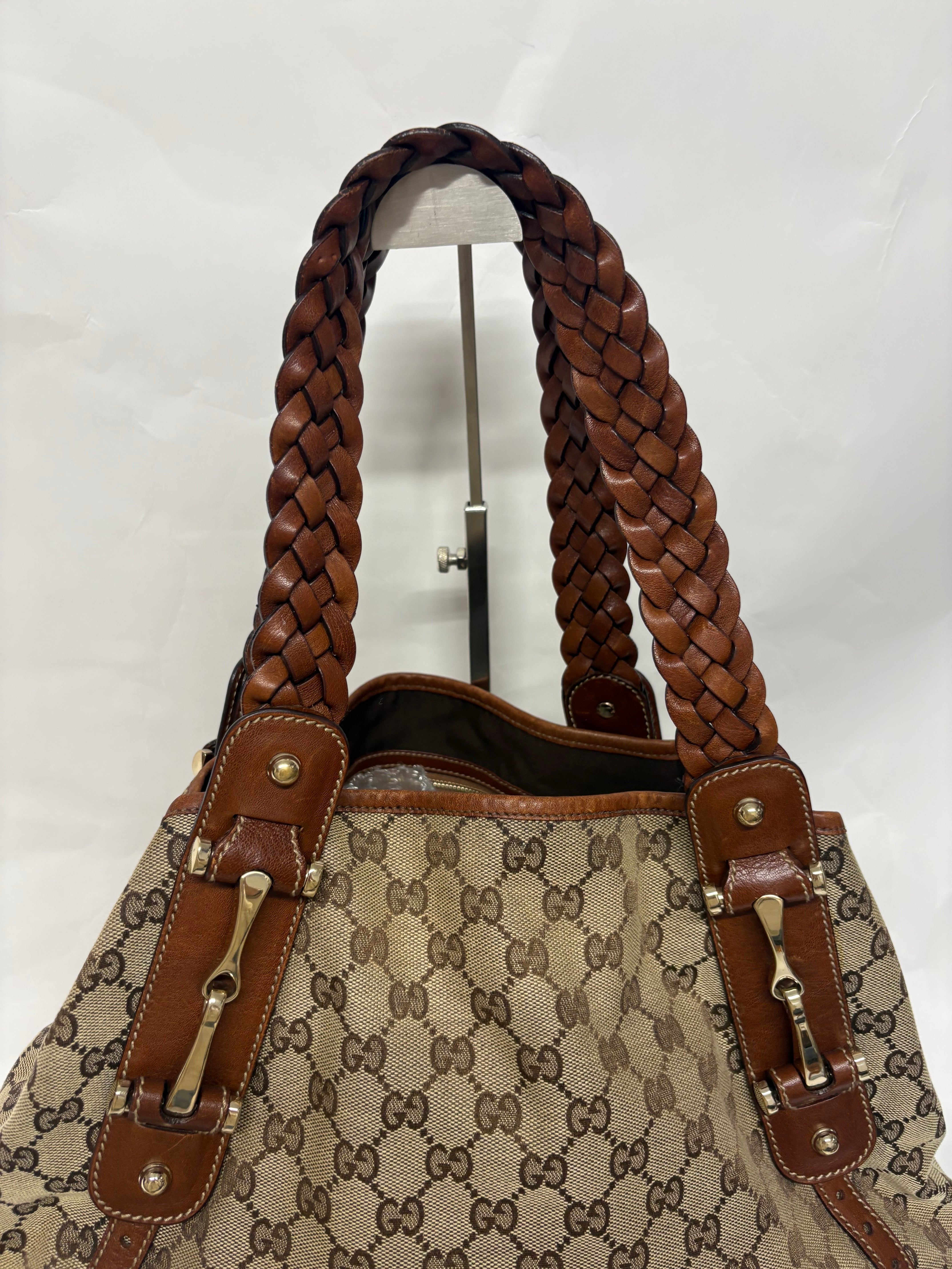 Gucci Pelham clásico en lona GG beige con piel marrón y asas trenzadas mediano
