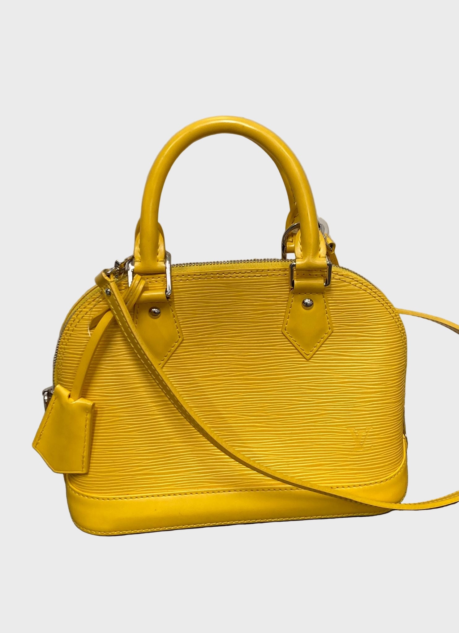 Louis Vuitton Alma bb piel EPI amarillo
