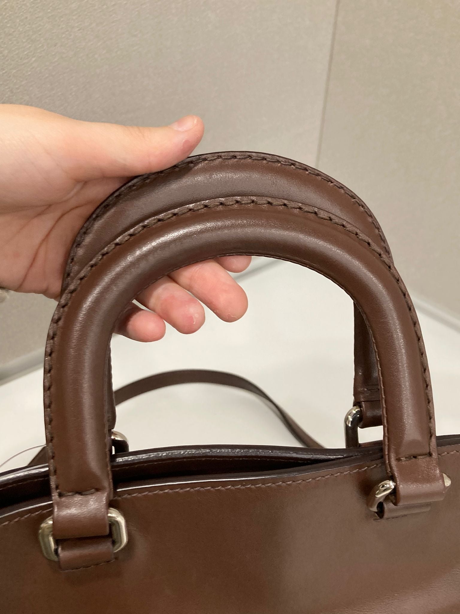 Prada Bauletto 2Way en piel marrón con bandolera