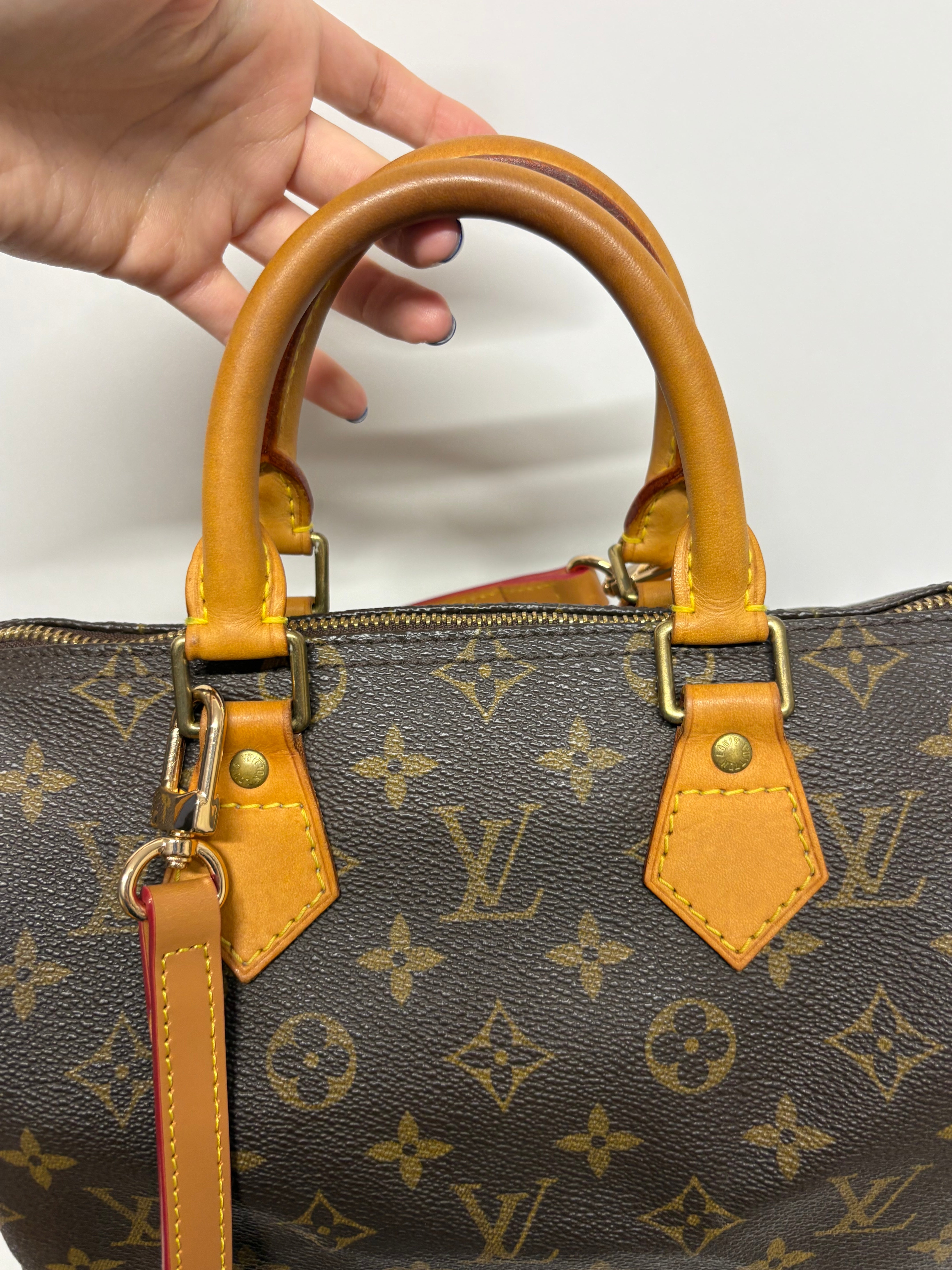 Louis Vuitton Speedy 25 Monogram con bandolera extra