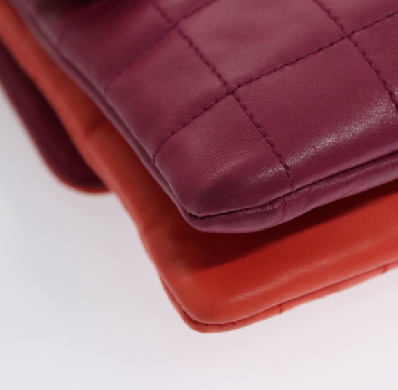 Chanel Vintage Chocolate Bar Double Side Flap – Piel morada y roja
