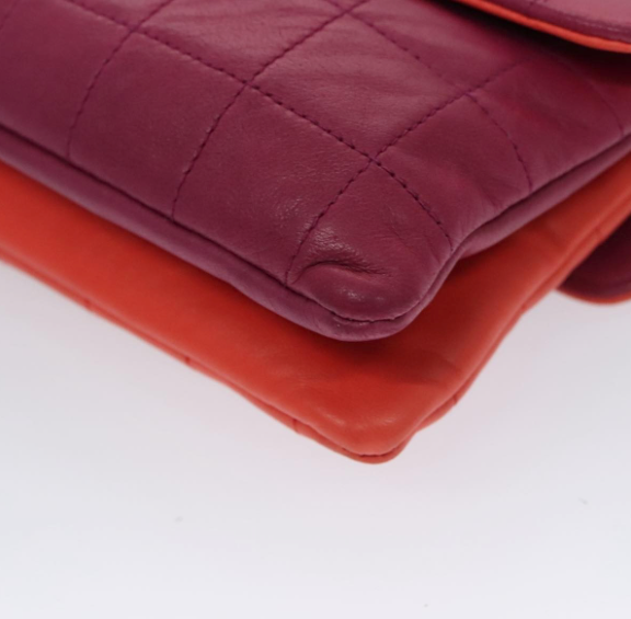 Chanel Vintage Chocolate Bar Double Side Flap – Piel morada y roja