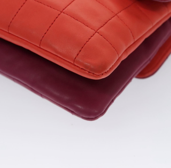 Chanel Vintage Chocolate Bar Double Side Flap – Piel morada y roja