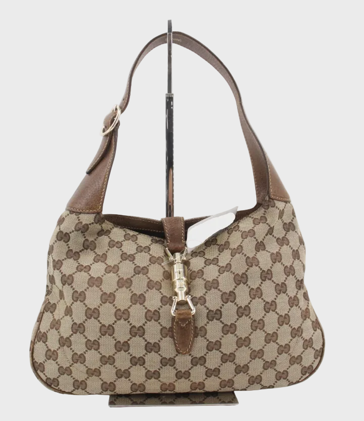 Gucci Jackie clásica GG canvas marrón con cierre pistón dorado