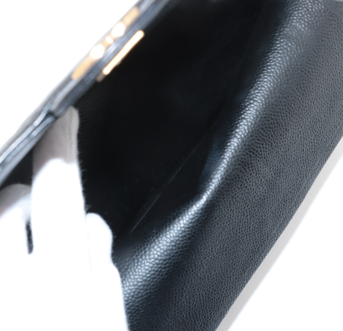 Chanel Classic Double Flap Mediano 11.12 en piel negra con hardware 24k