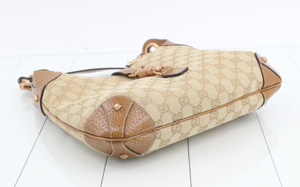Gucci jackie gg canvas gold rosado y marron