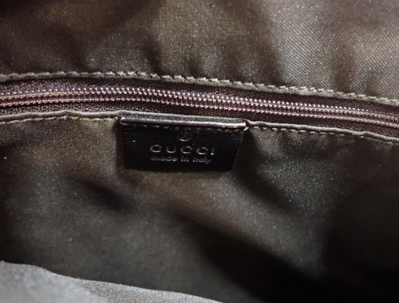 Gucci Jackie Grande Clásico Vintage | GG Canvas & Piel Marrón Oscuro