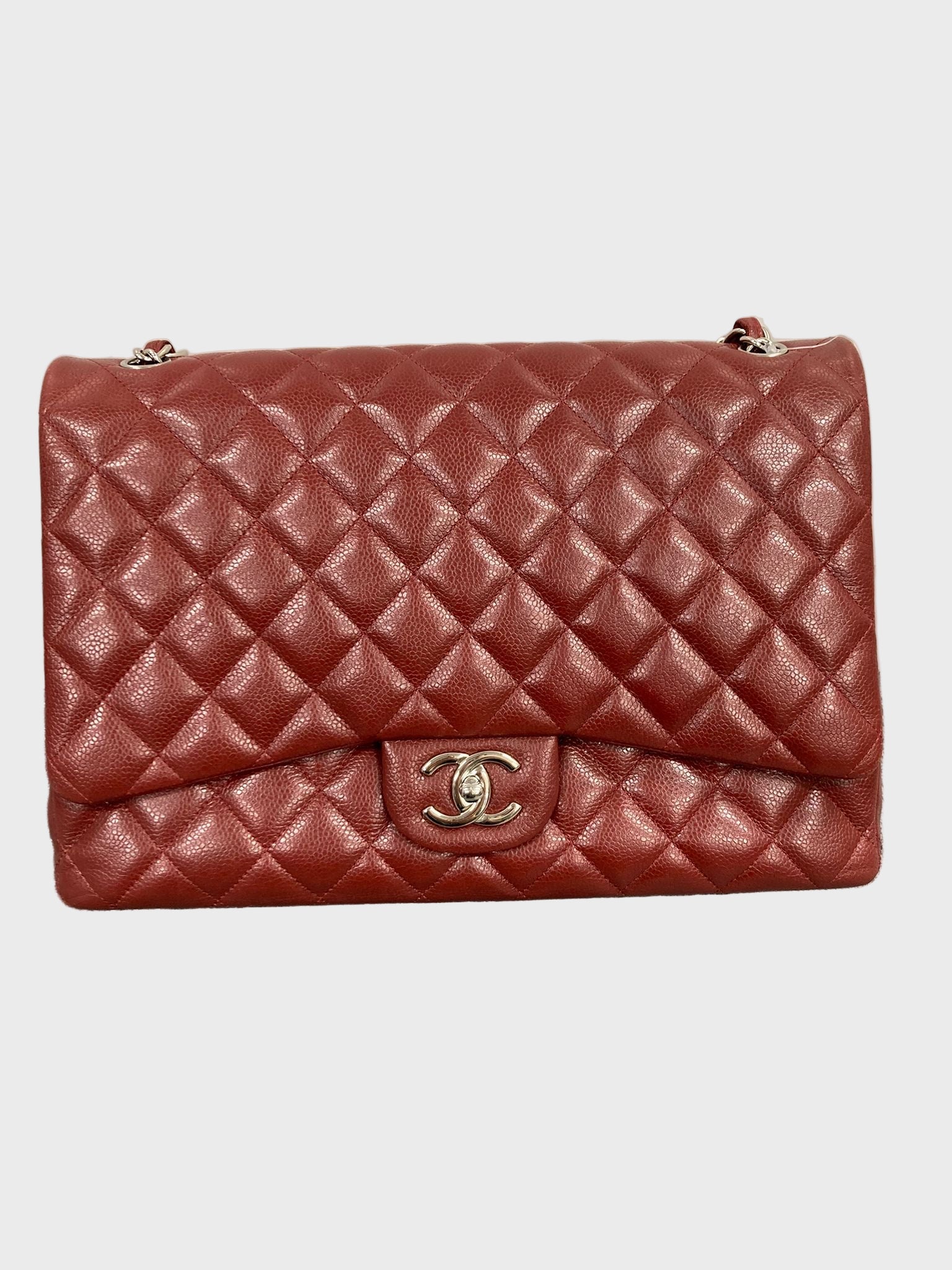 Chanel Clásico Doble Solapa 34 en piel caviar burdeos y herrajes plateados