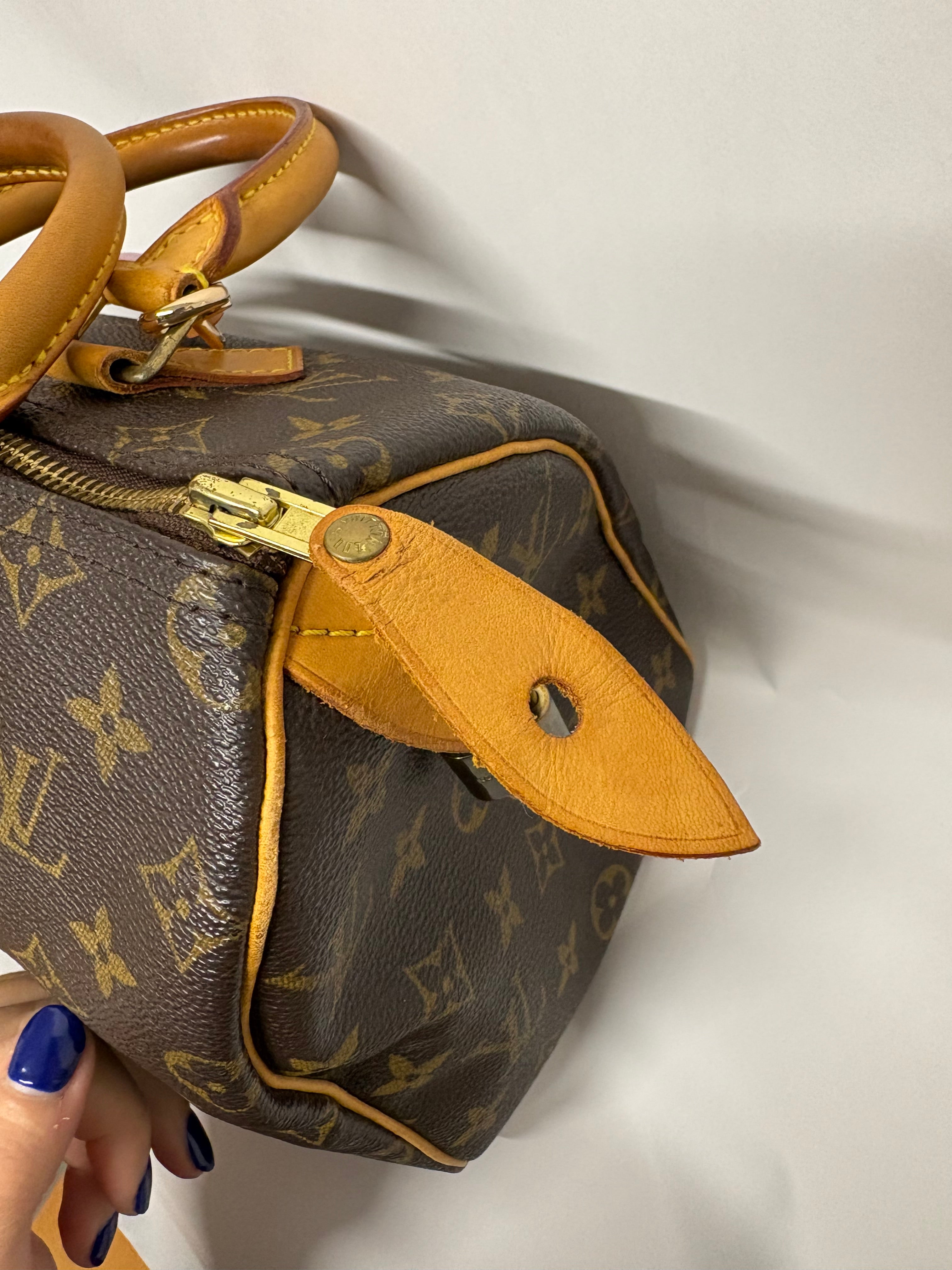 Louis Vuitton Speedy 25 Monogram con bandolera extra