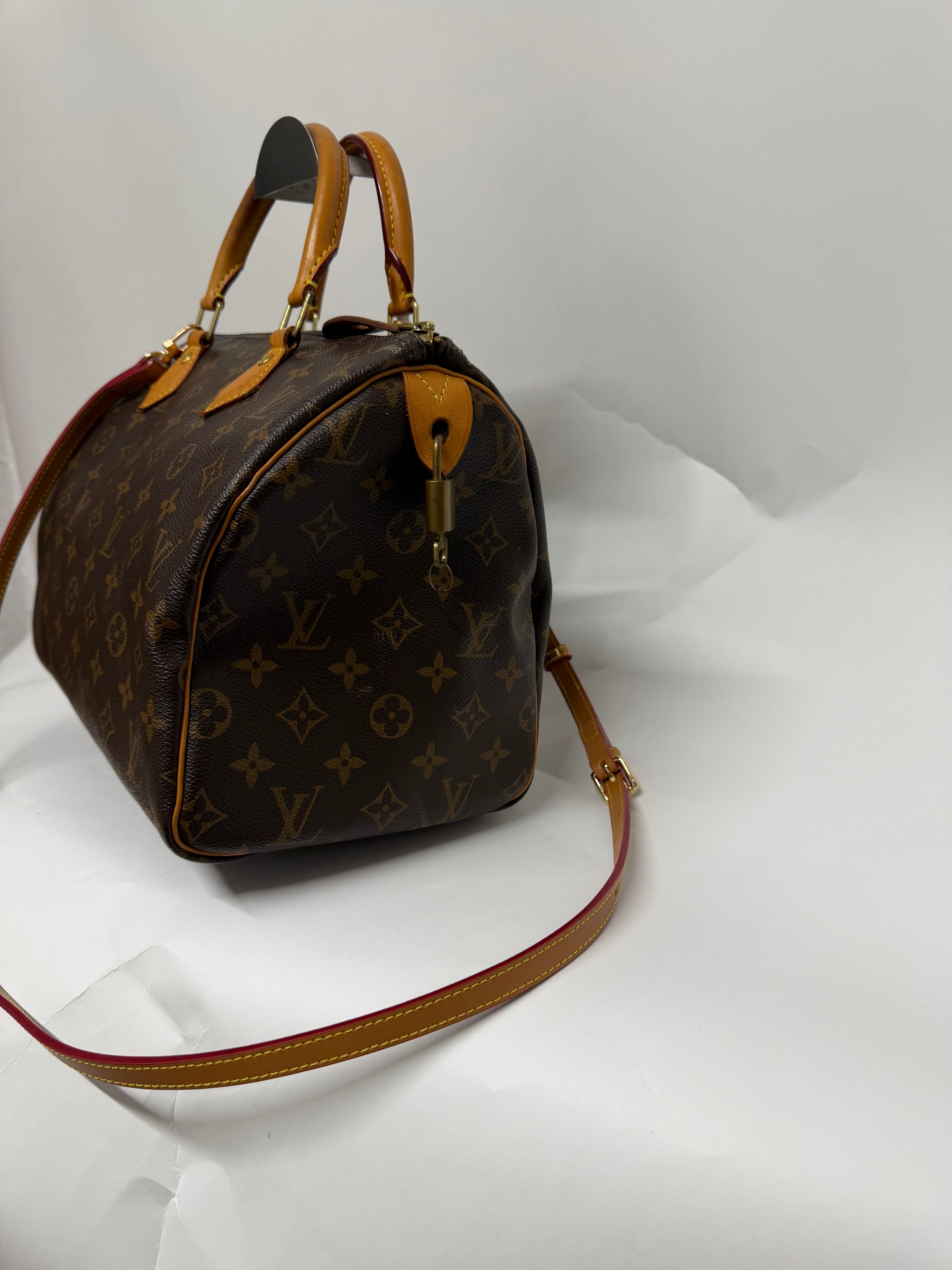 Louis Vuitton Speedy 30 Monogram con bandolera extra