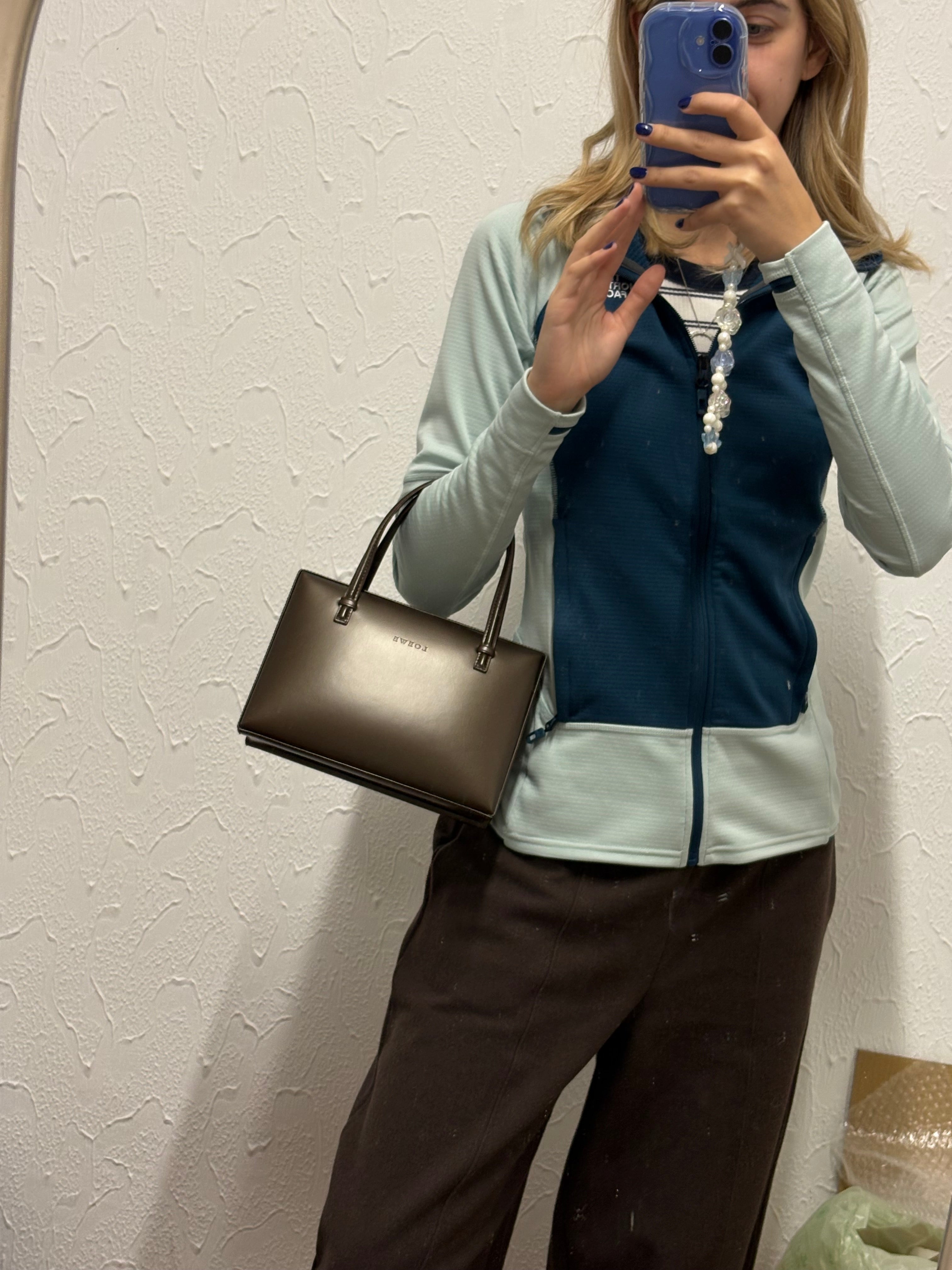 Loewe mini marron de mano piel cepillada