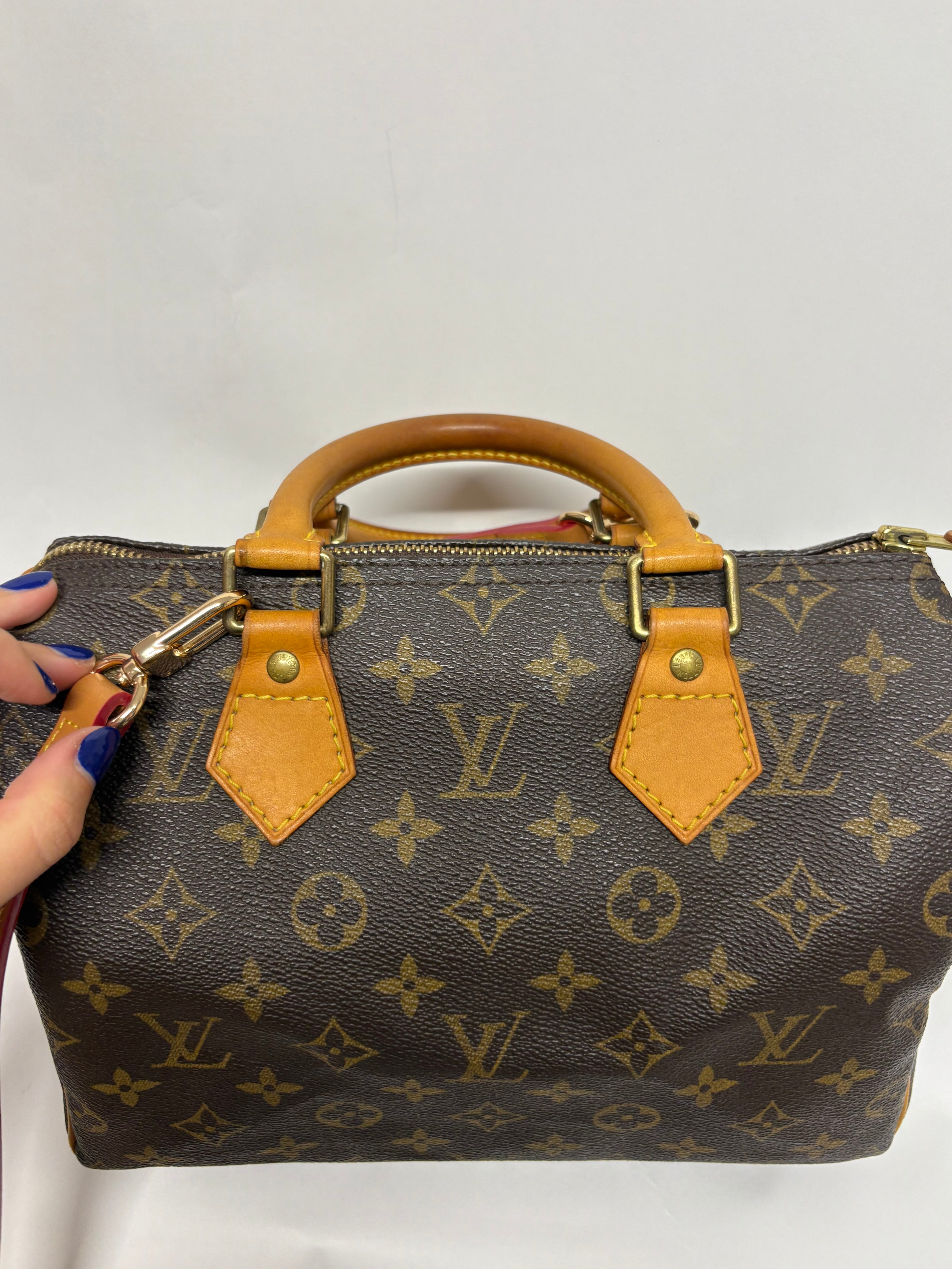 Louis Vuitton Speedy 25 Monogram con bandolera extra