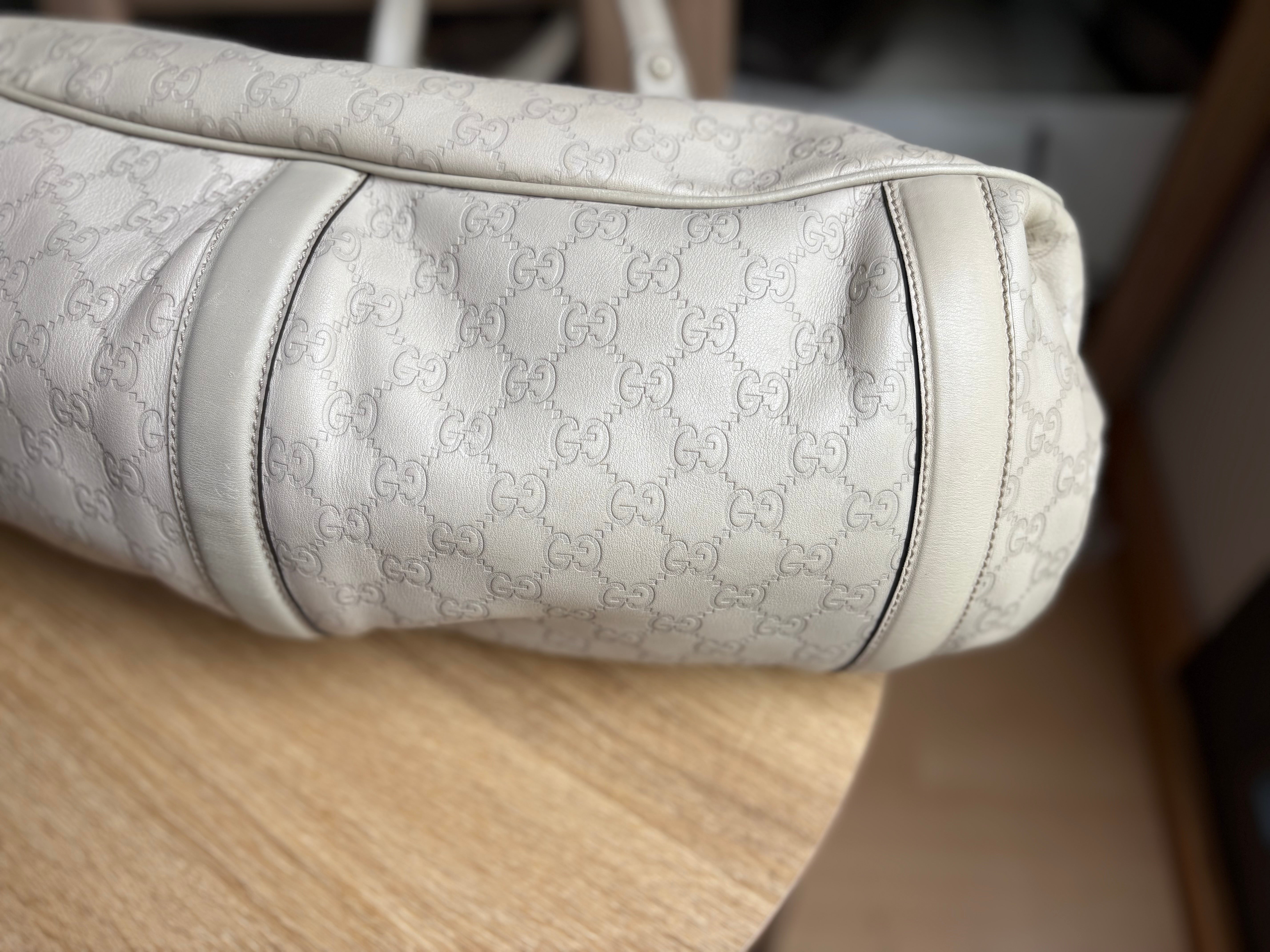 Gucci Pelham en piel Guccissima blanca