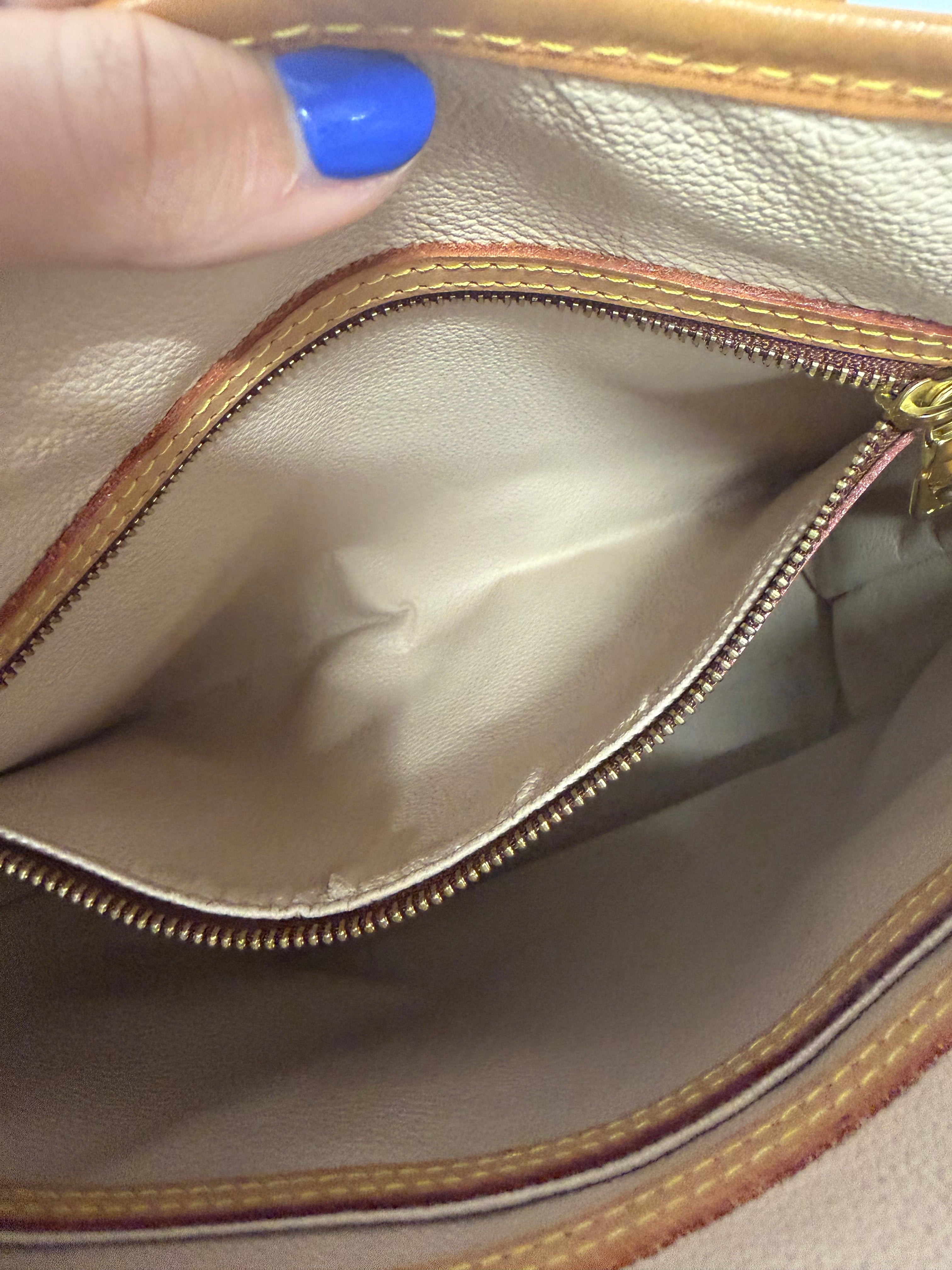Louis Vuitton Bucket PM Monogram Canvas con pochette