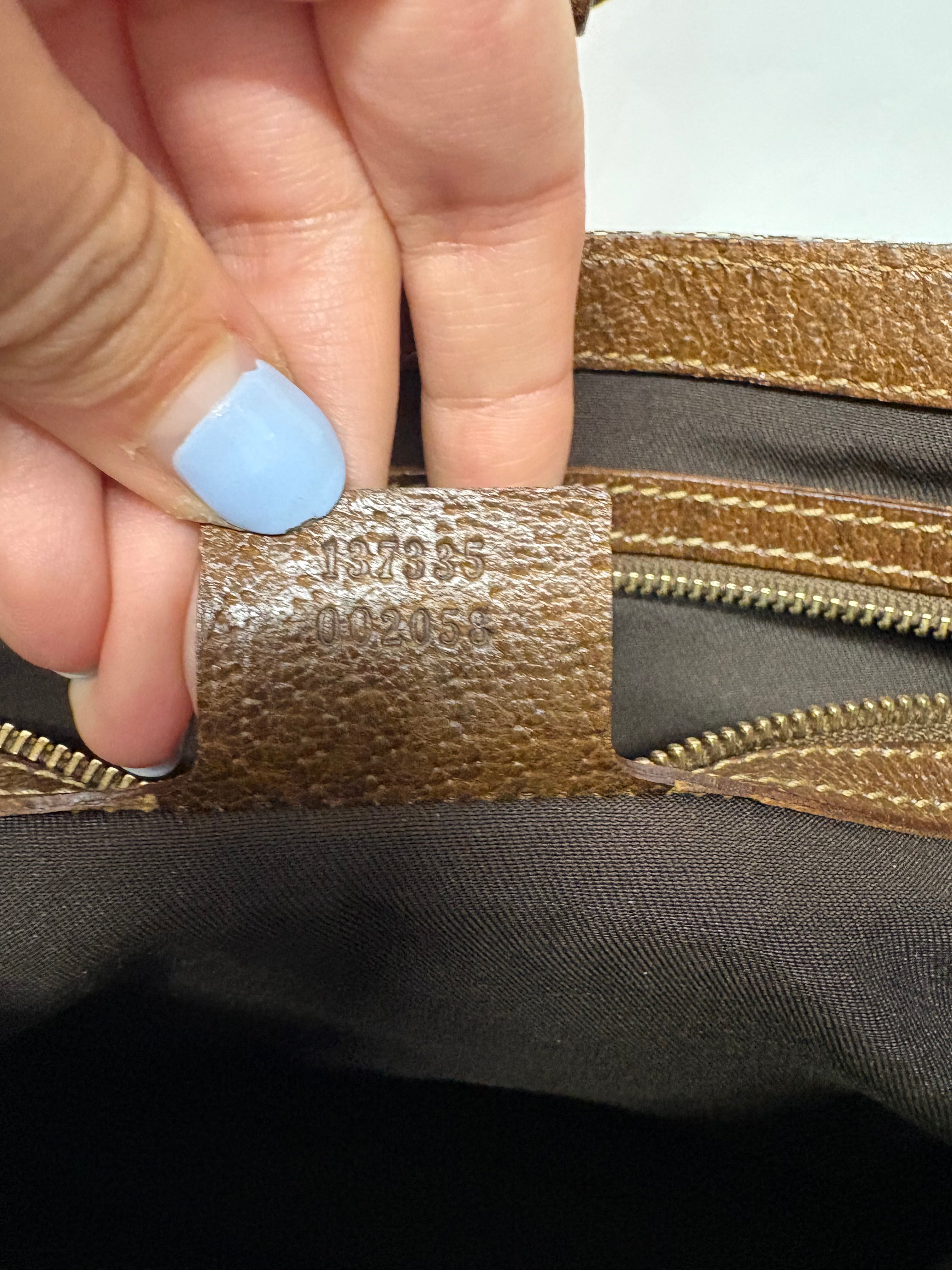 Gucci Jackie clásica GG canvas marrón con cierre pistón dorado