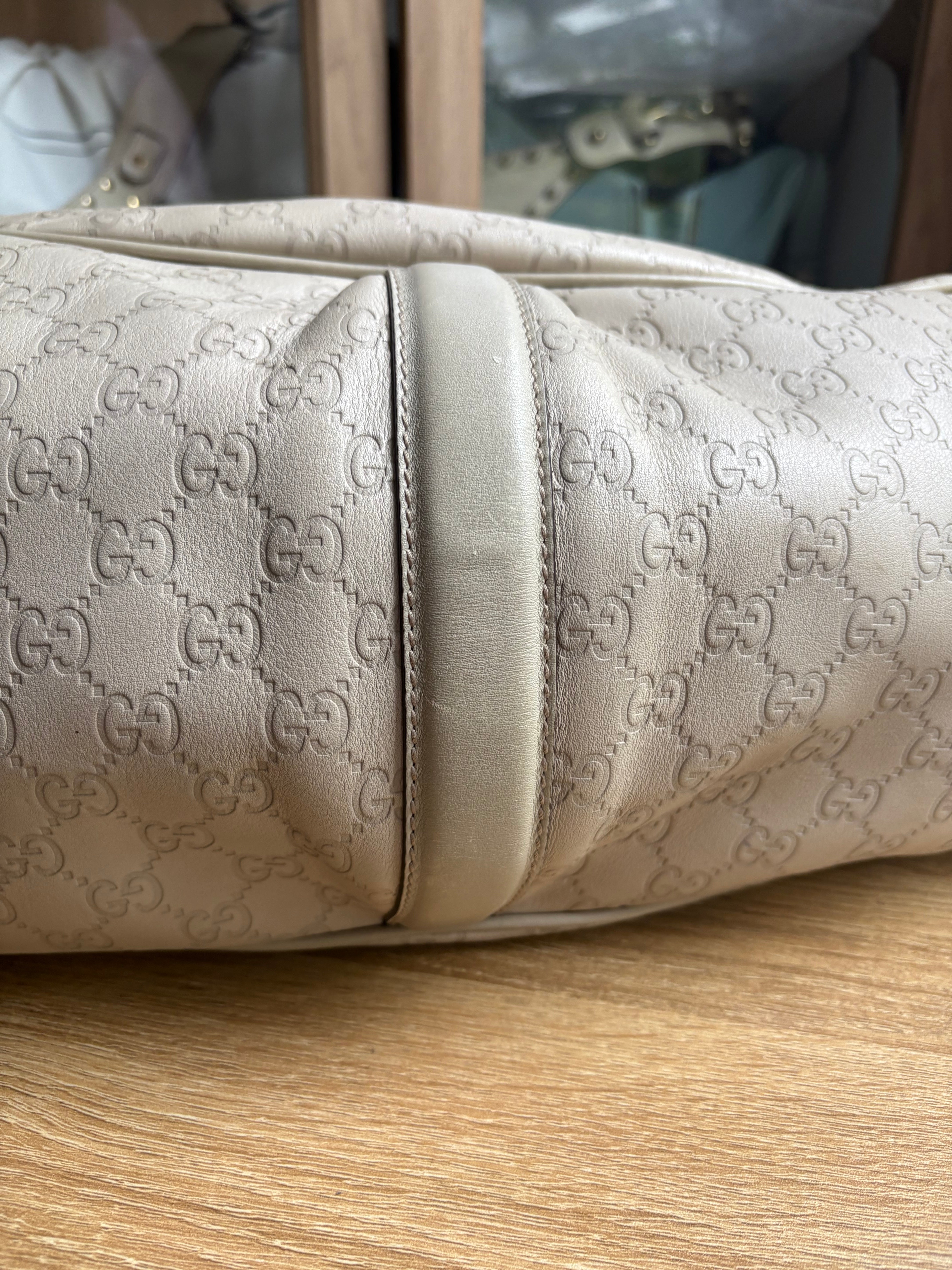 Gucci Pelham en piel Guccissima blanca