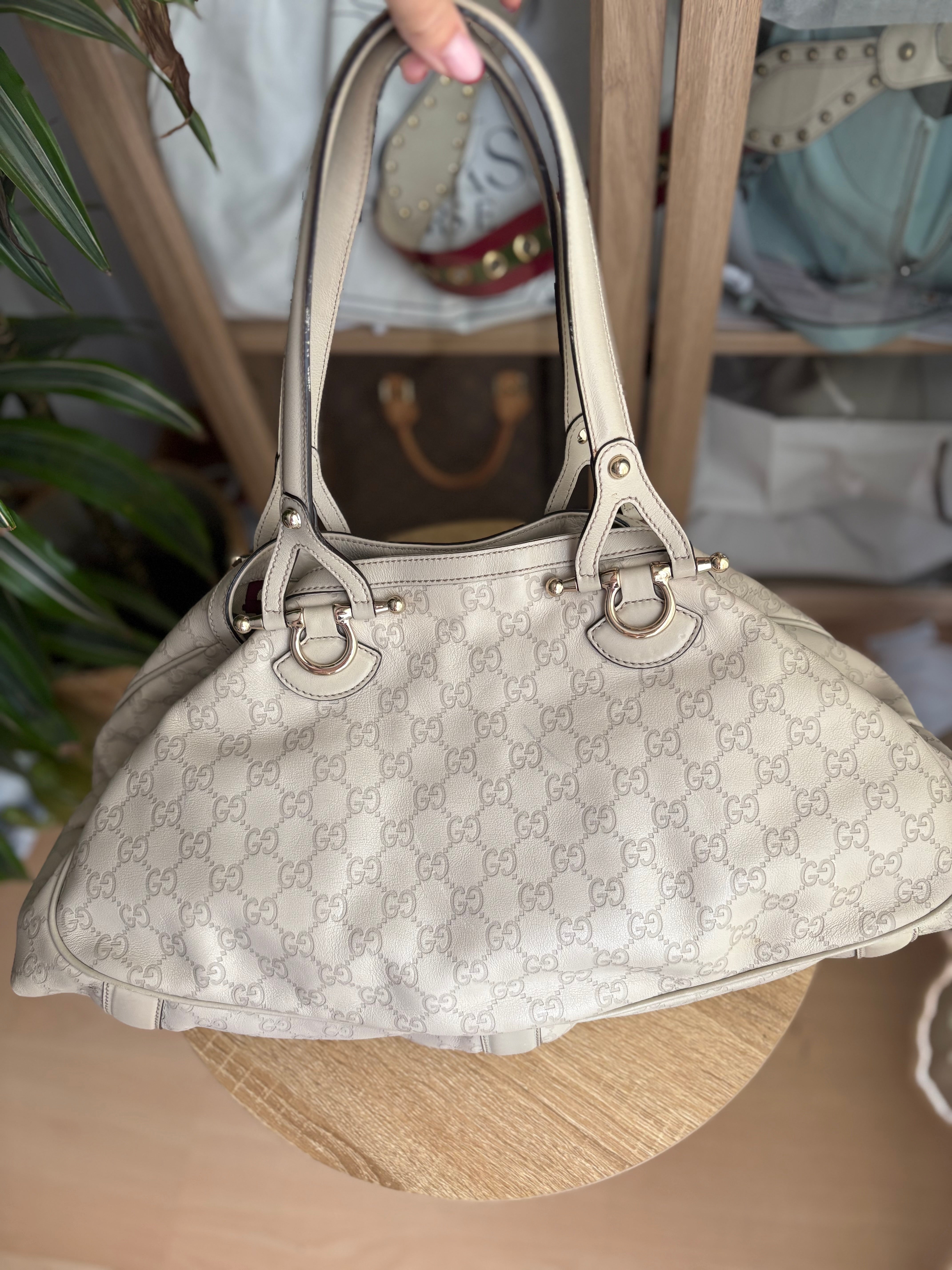 Gucci Pelham en piel Guccissima blanca