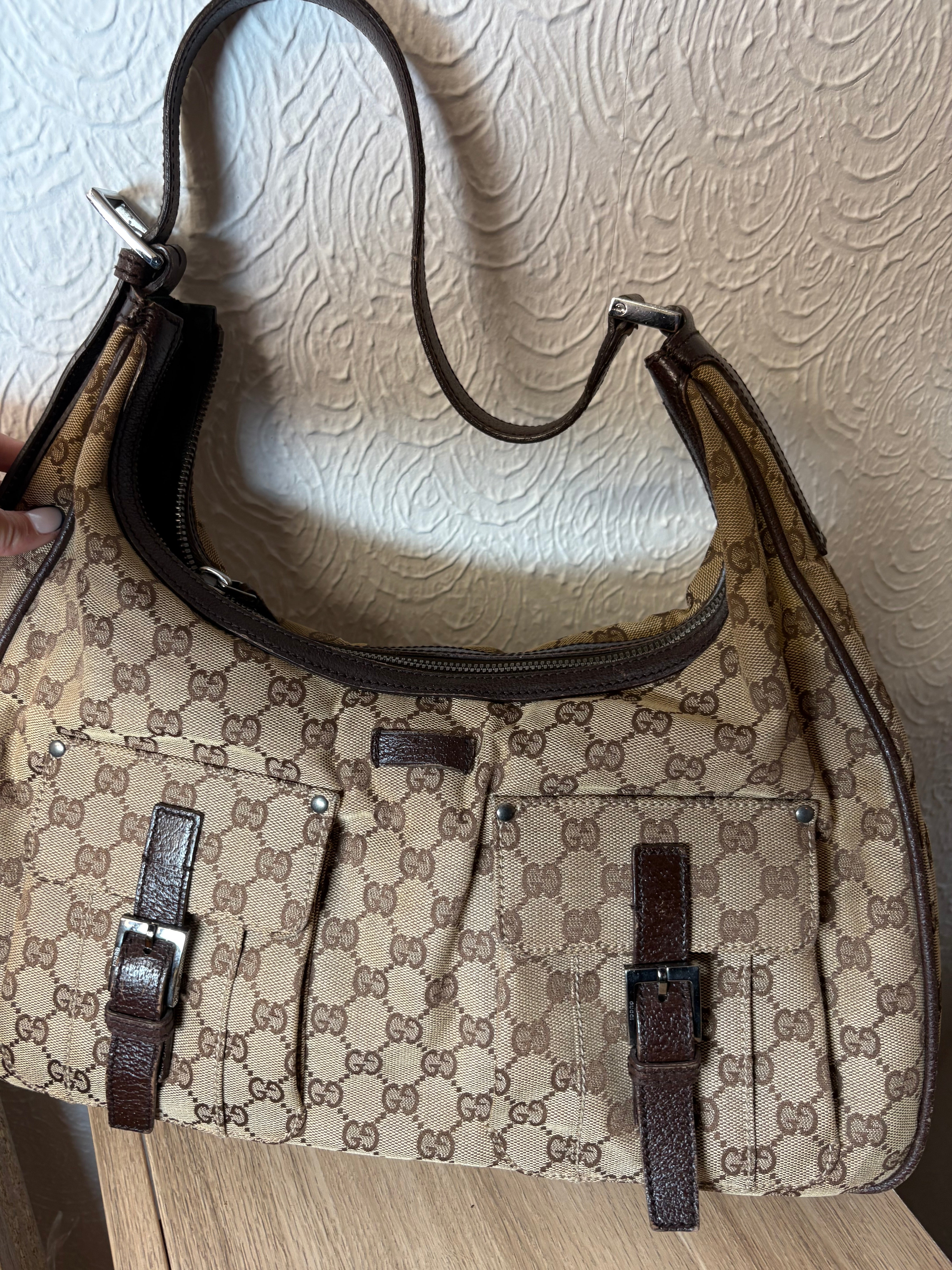 GUCCI  Bolso de hombro GG Canvas con bolsillos frontales