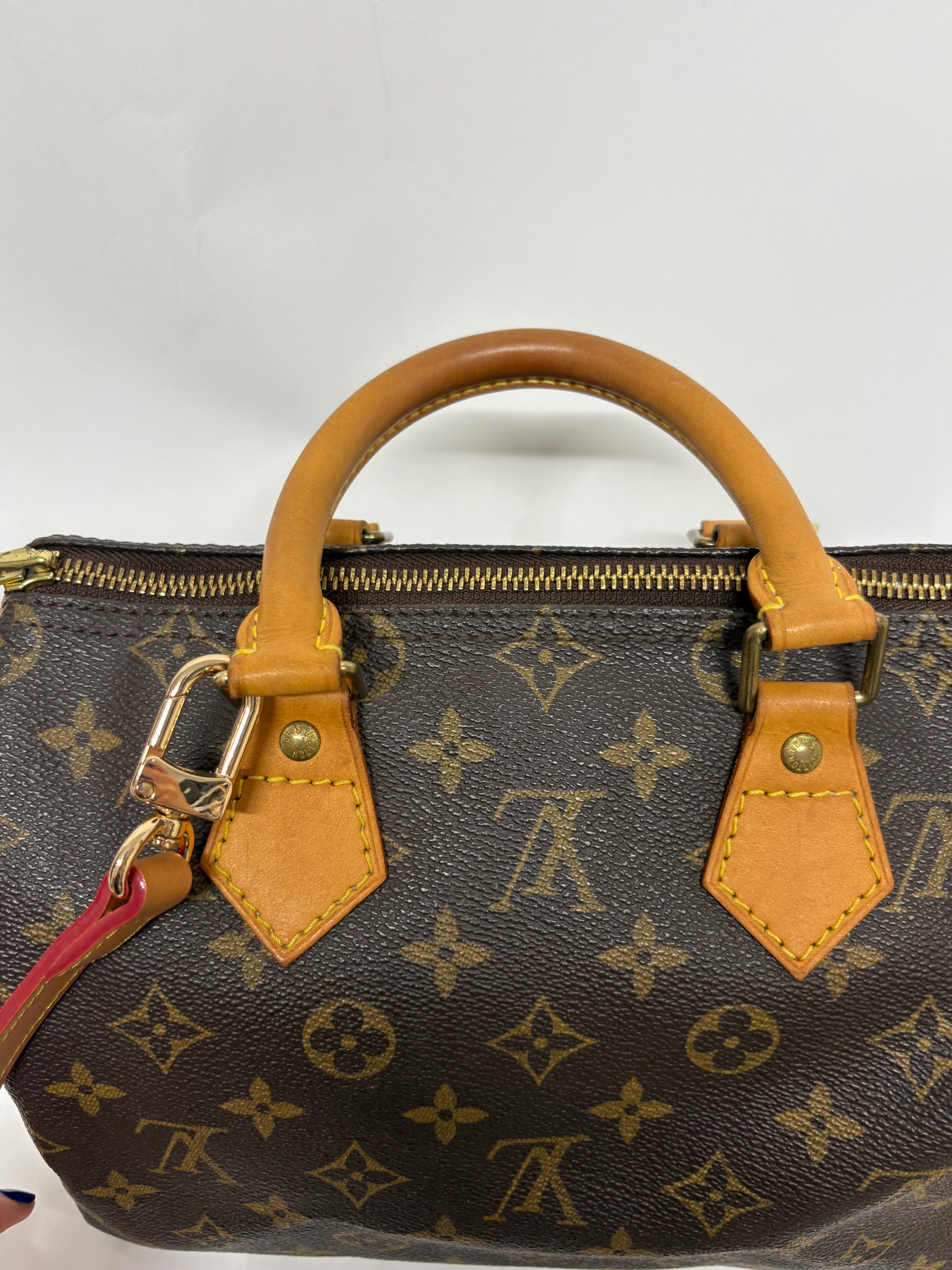 Louis Vuitton Speedy 25 Monogram con bandolera extra