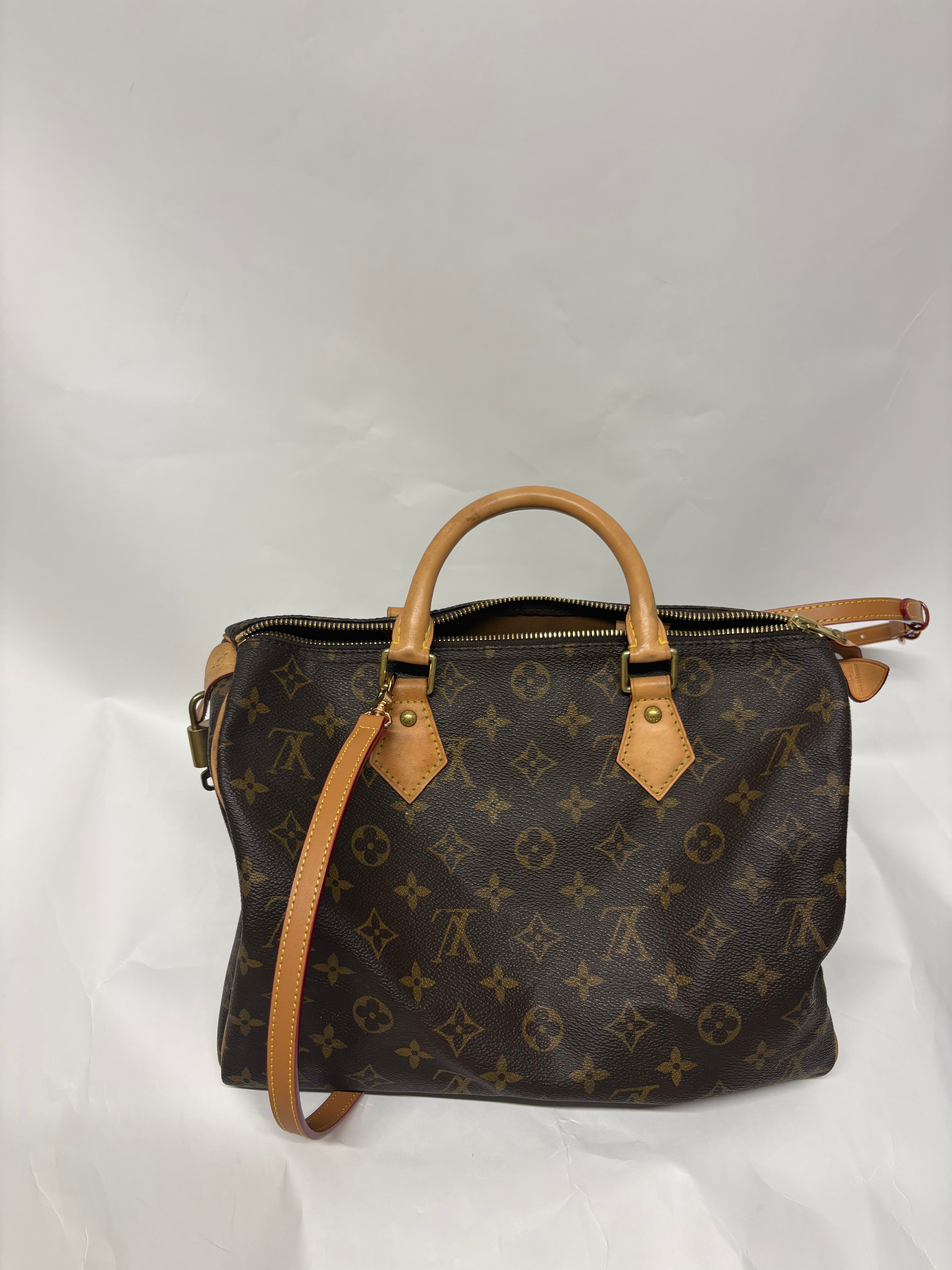 Louis Vuitton Speedy 30 Monogram con bandolera extra