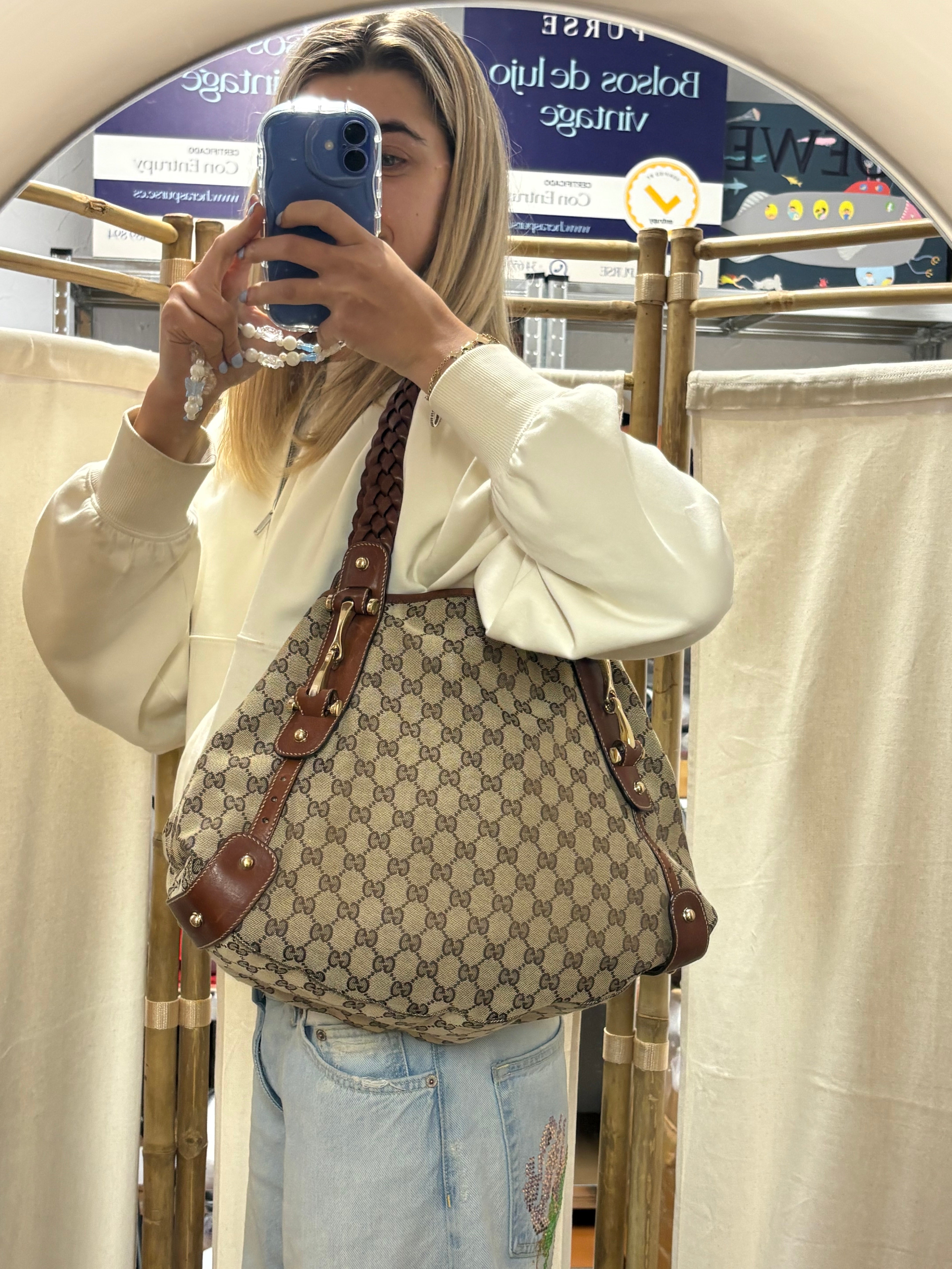 Gucci Pelham clásico en lona GG beige con piel marrón y asas trenzadas mediano