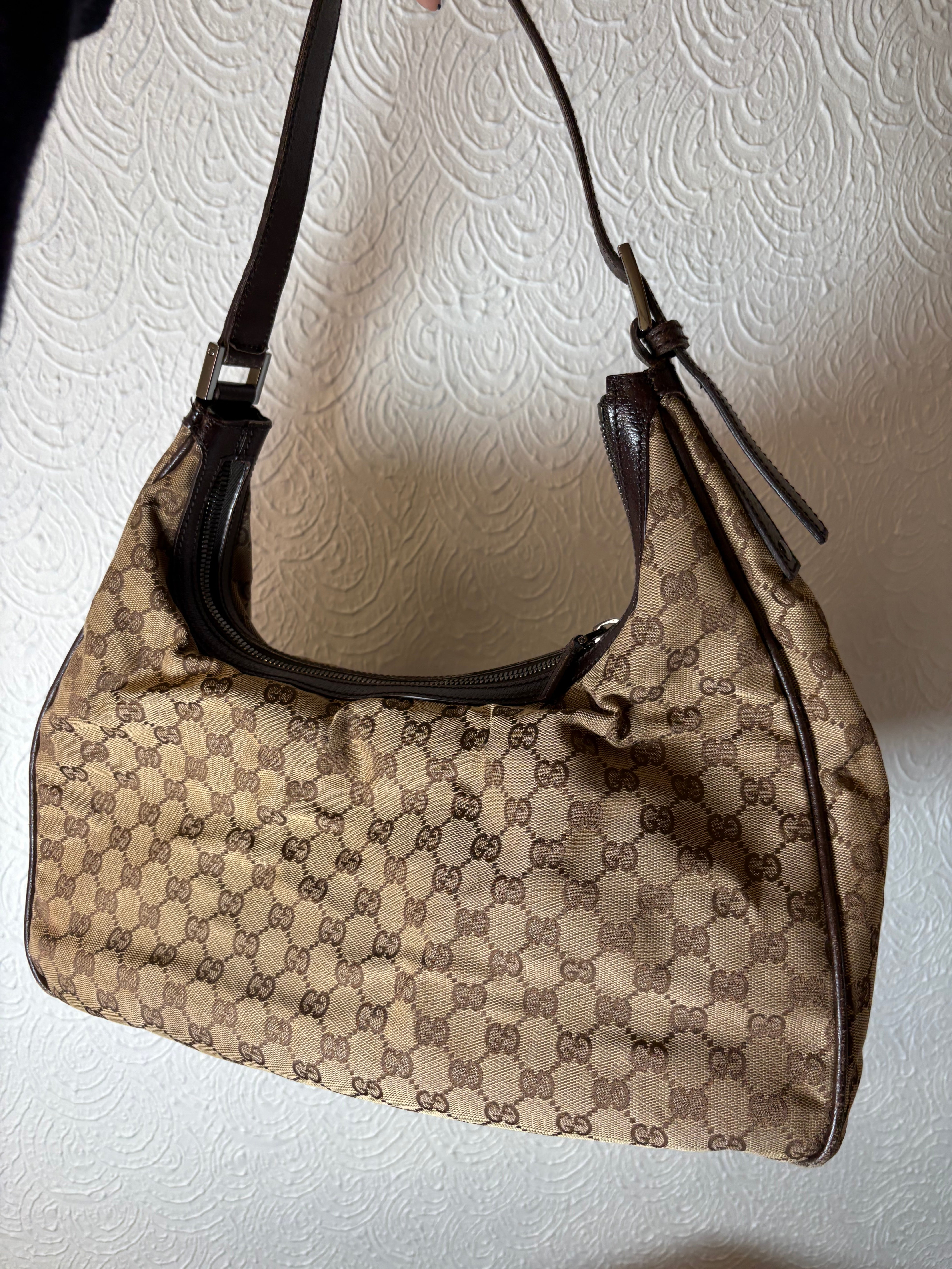 GUCCI  Bolso de hombro GG Canvas con bolsillos frontales