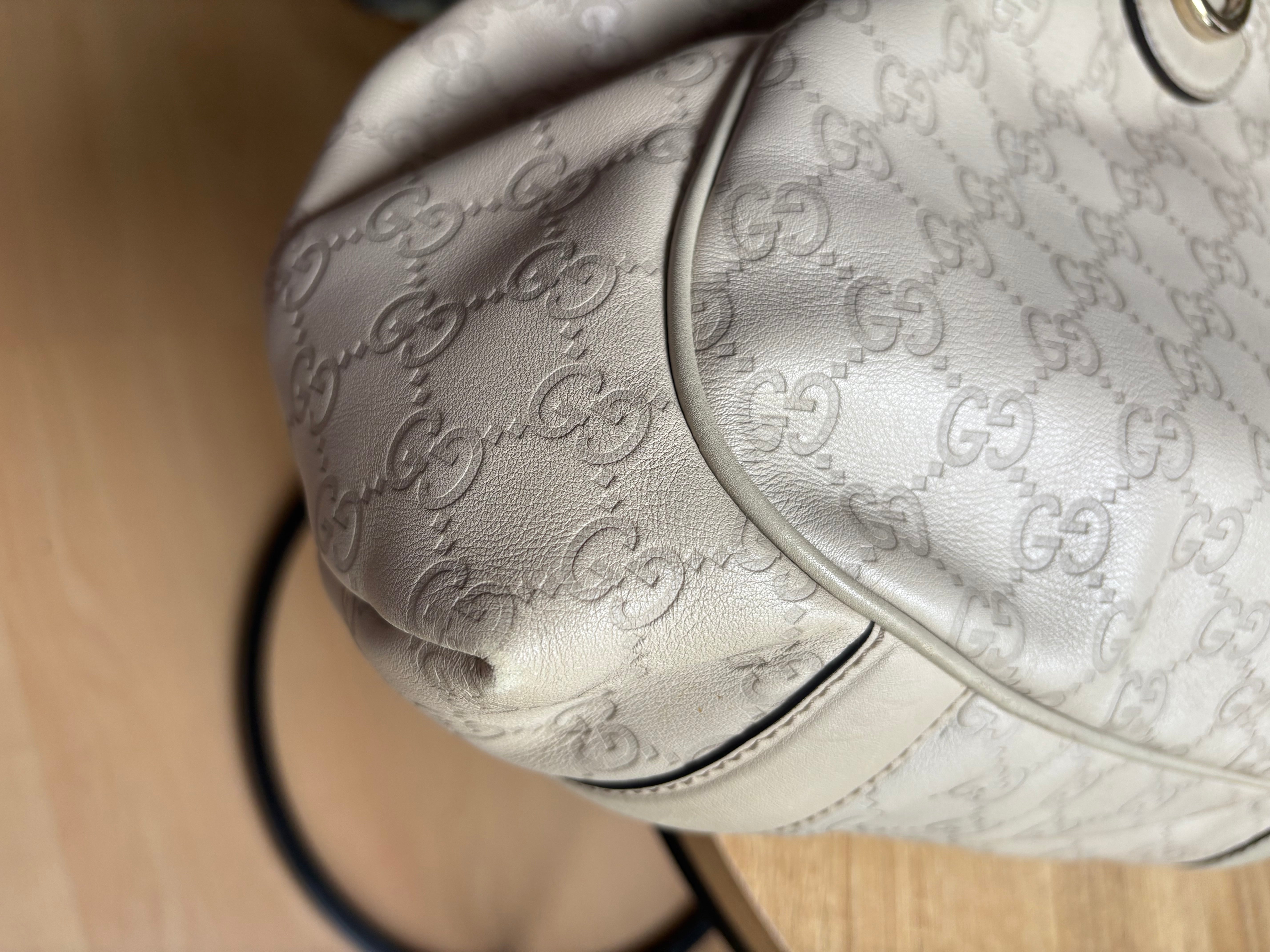 Gucci Pelham en piel Guccissima blanca