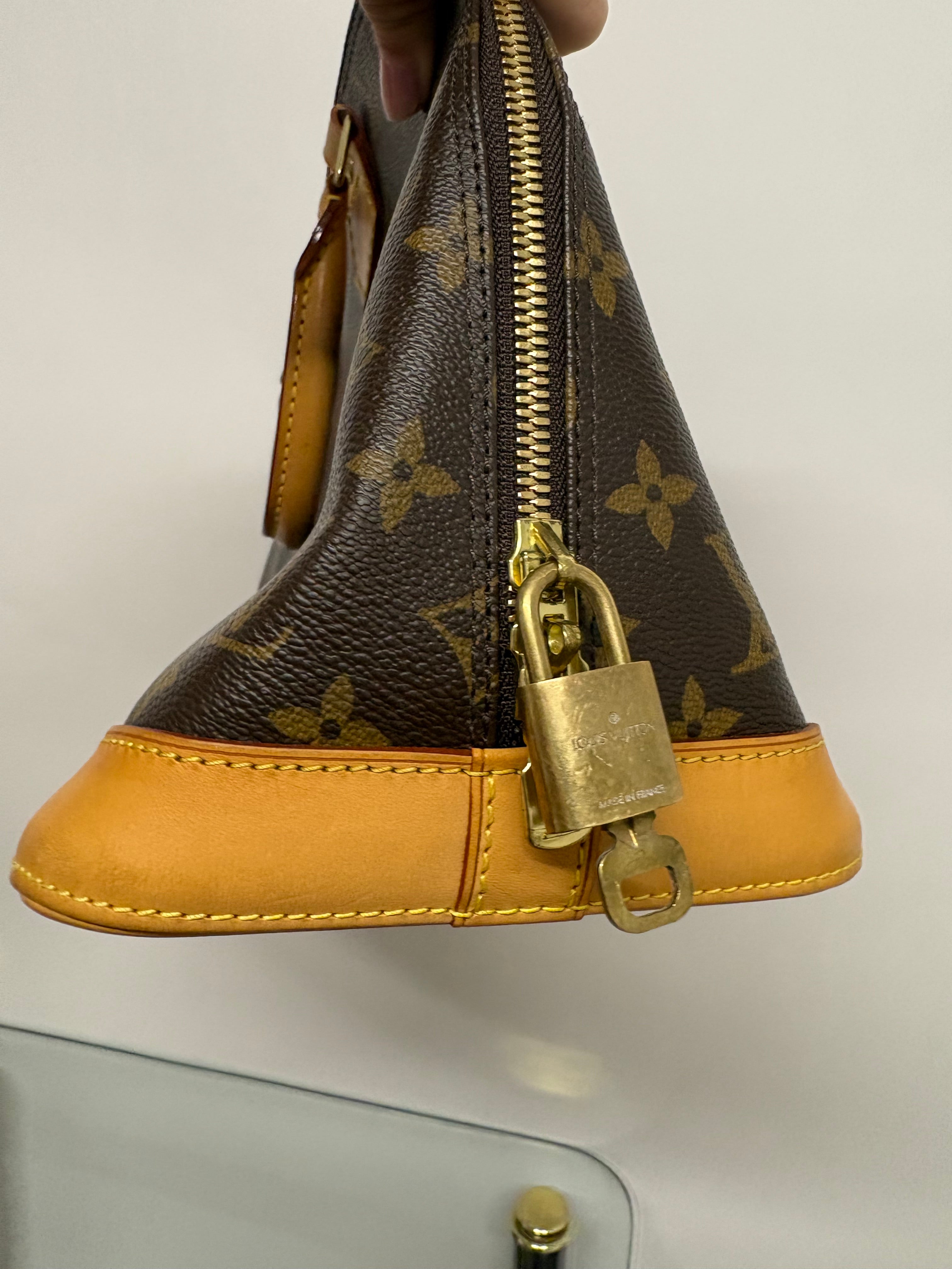 Louis Vuitton Alma MM canvas monogram