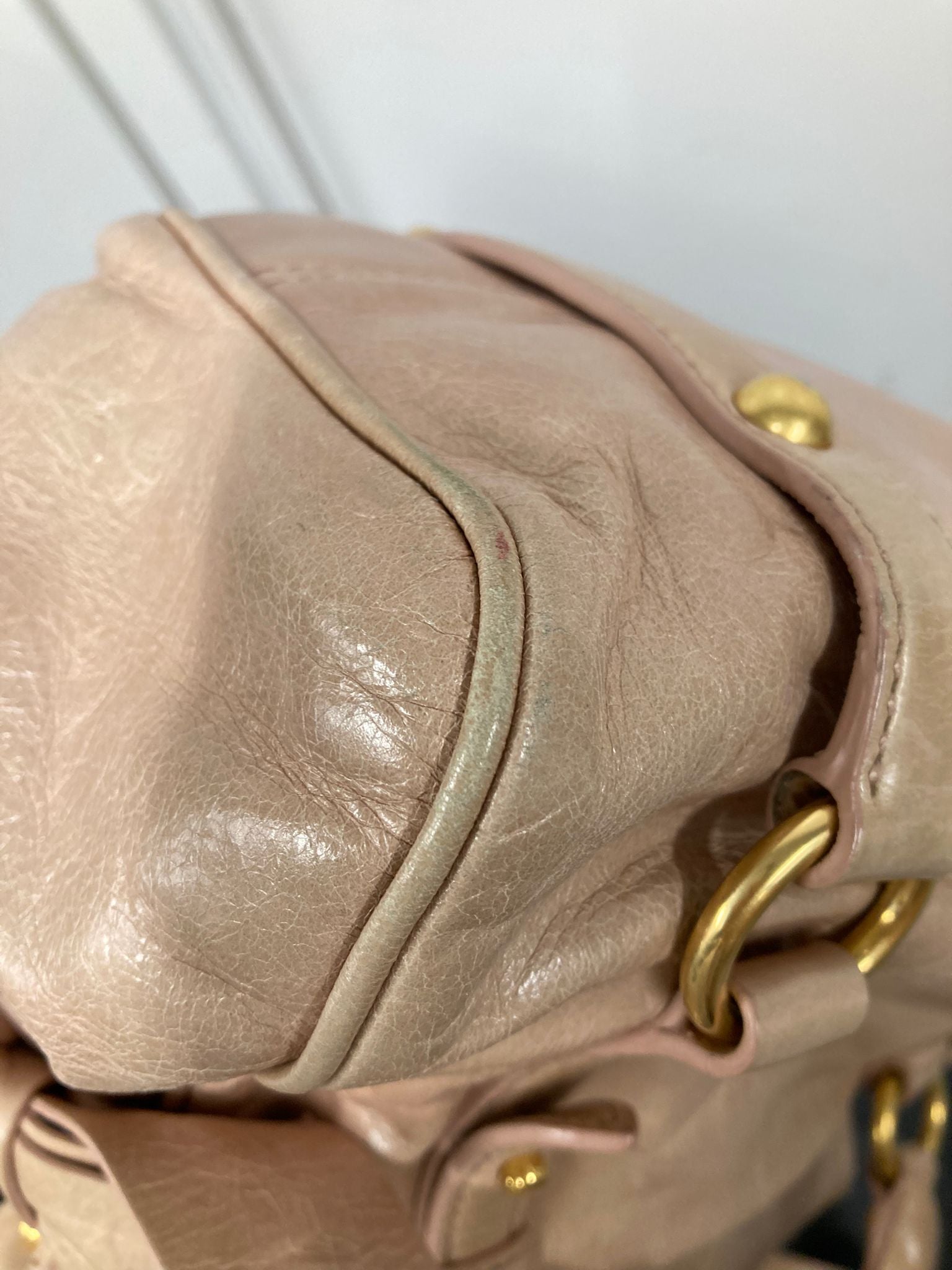 Miu Miu Vitello small rosa claro con bandolera