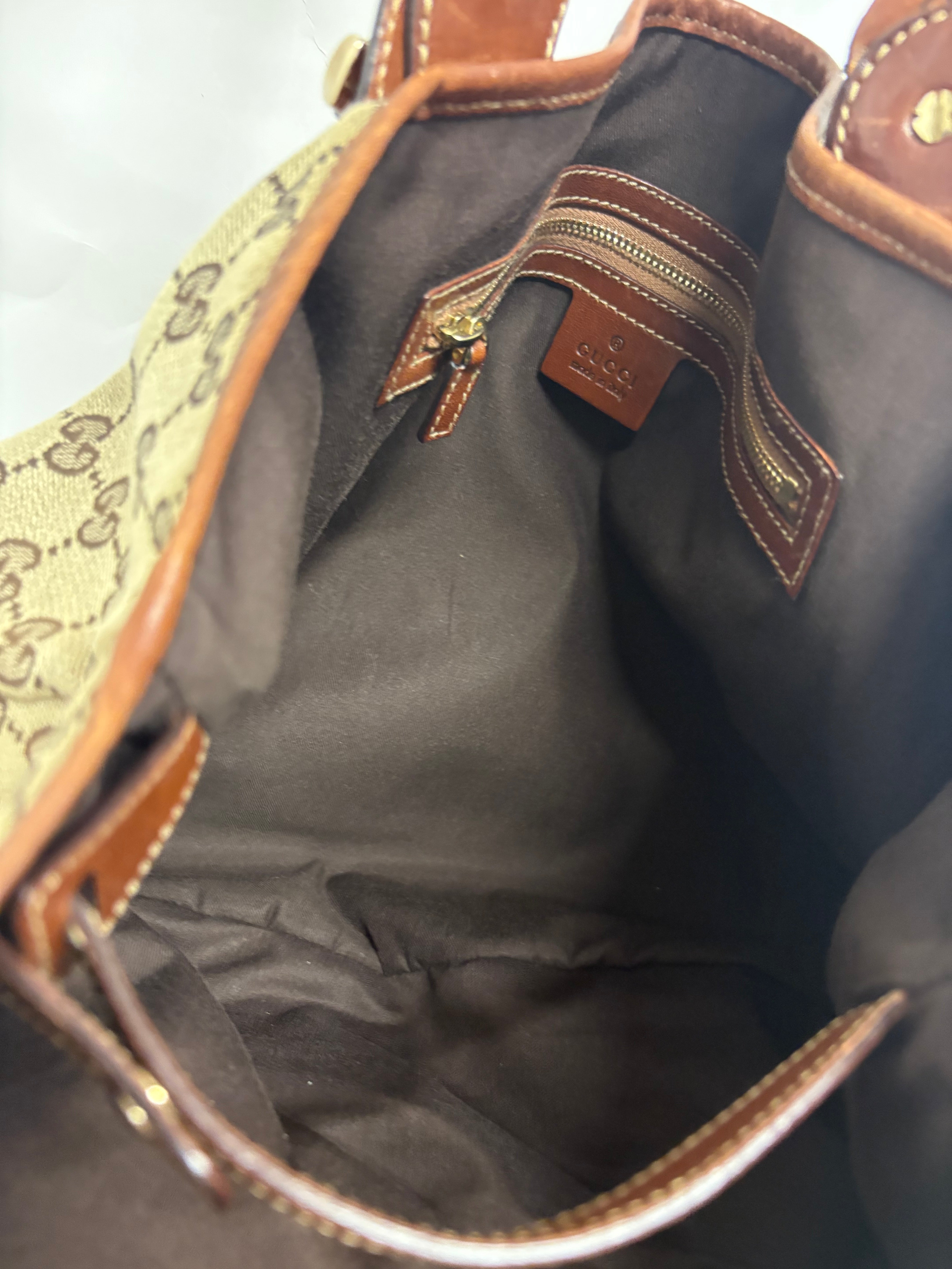 Gucci Pelham clásico en lona GG beige con piel marrón y asas trenzadas mediano