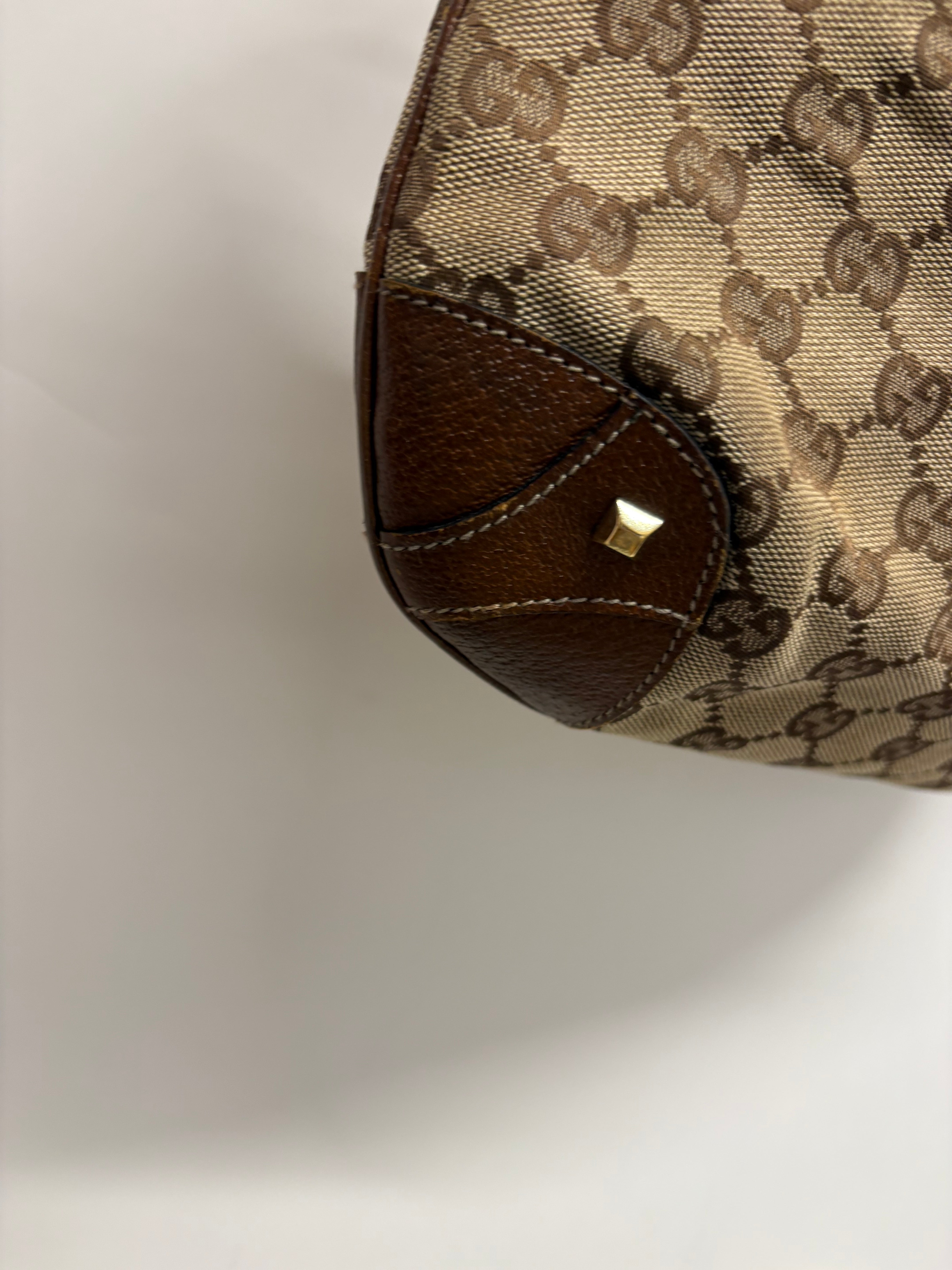Gucci Jackie clásico GG Canvas + cierre pistón