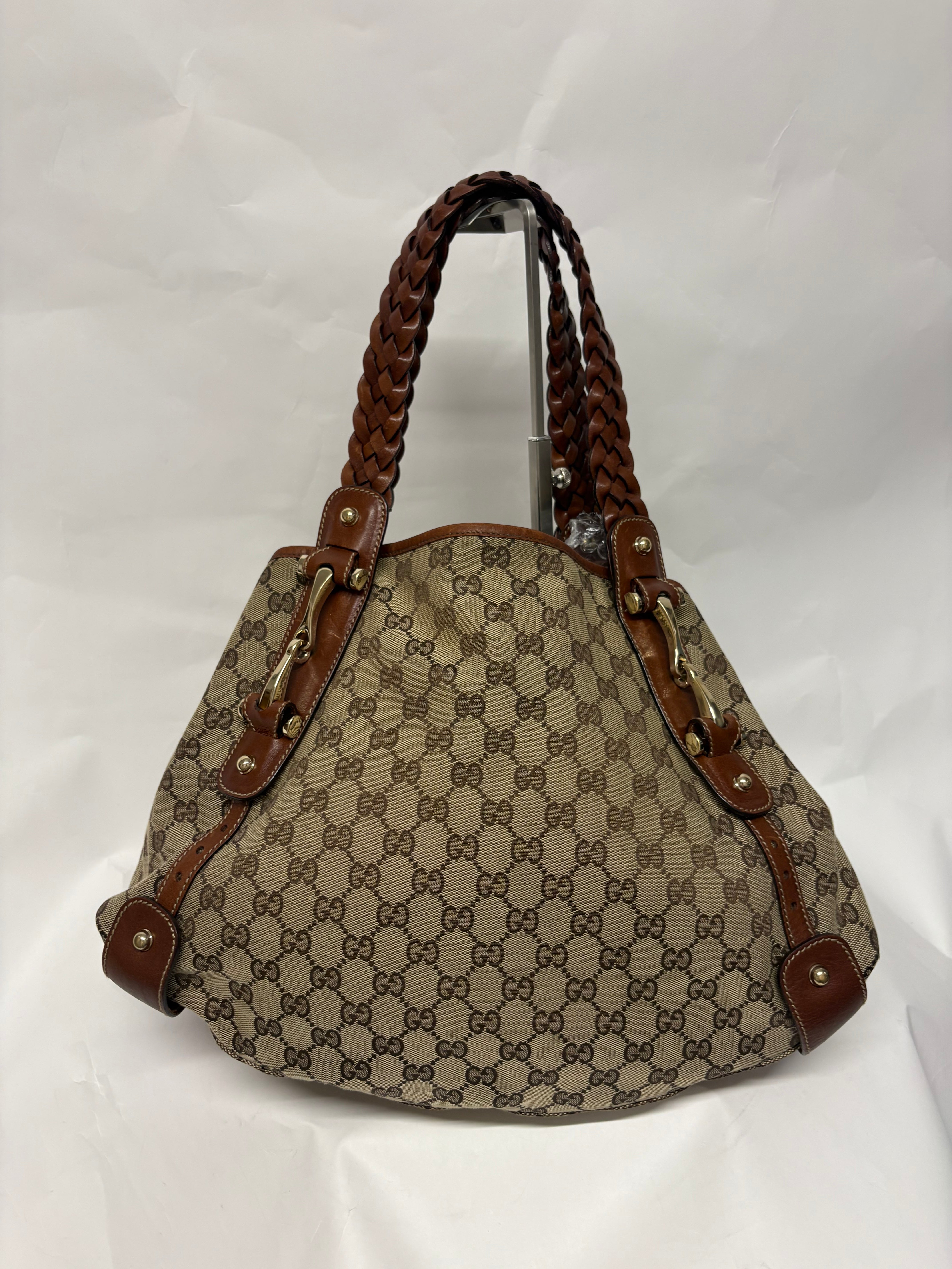 Gucci Pelham clásico en lona GG beige con piel marrón y asas trenzadas mediano
