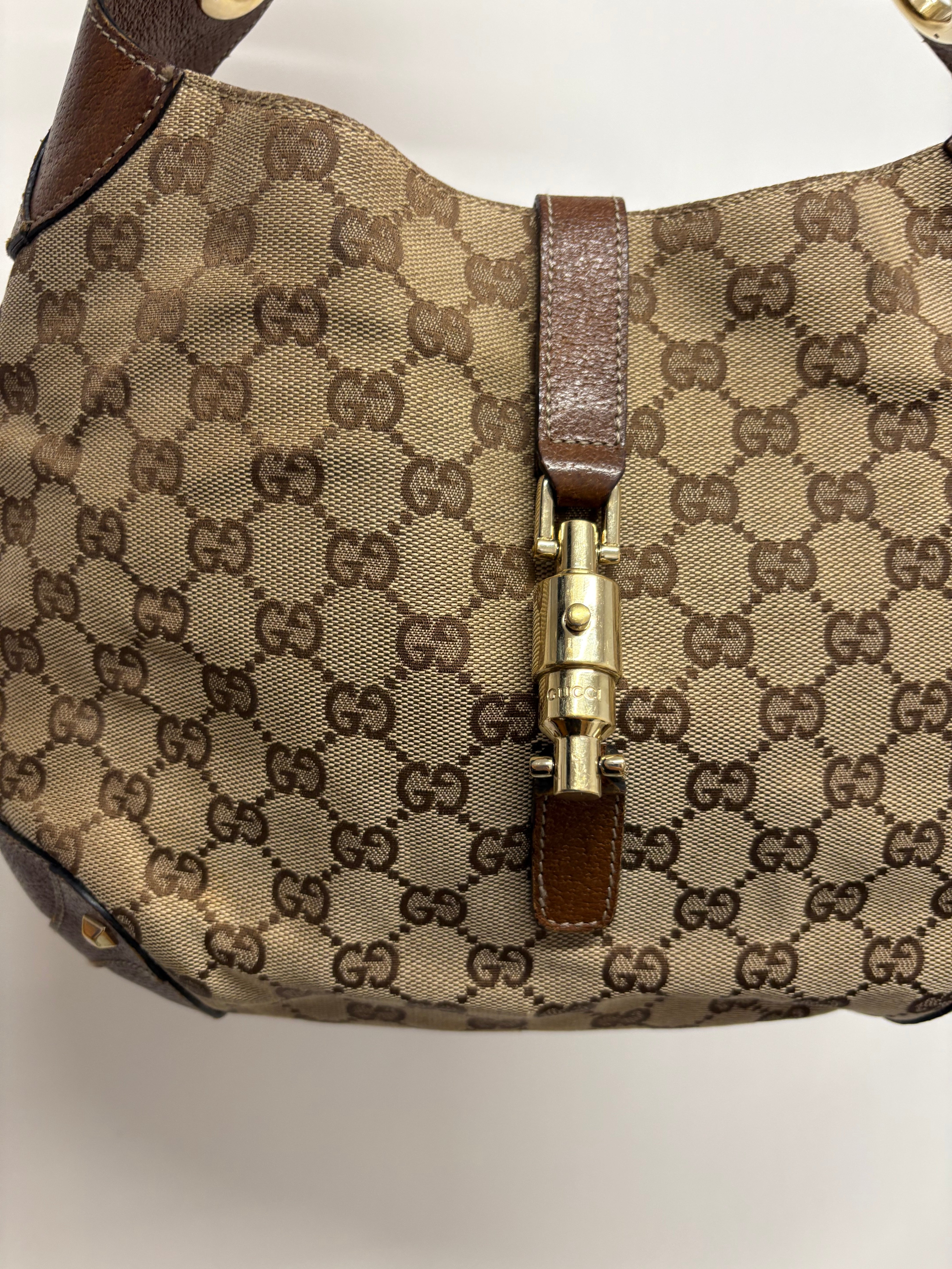 Gucci Jackie clásico GG Canvas + cierre pistón