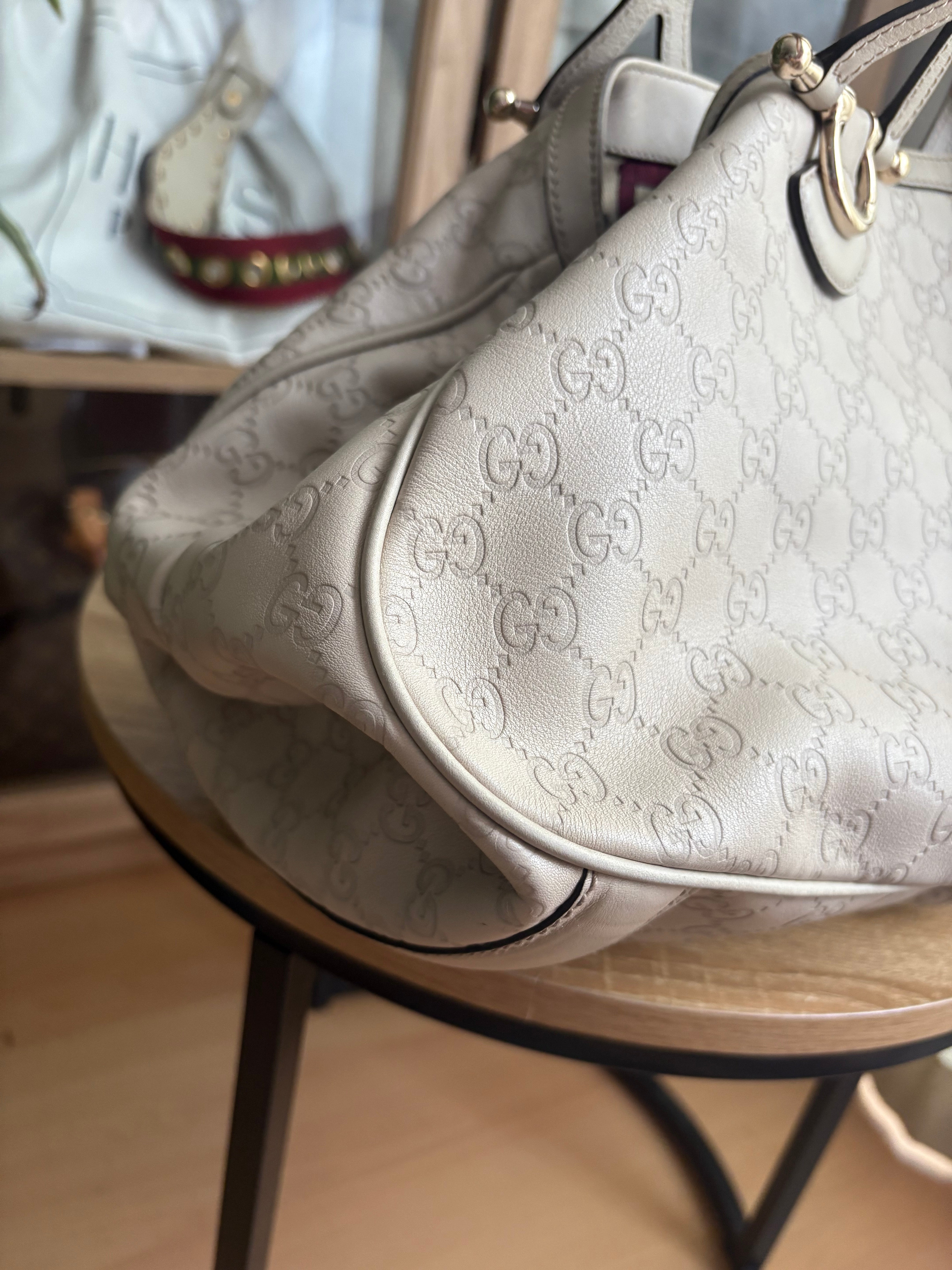 Gucci Pelham en piel Guccissima blanca