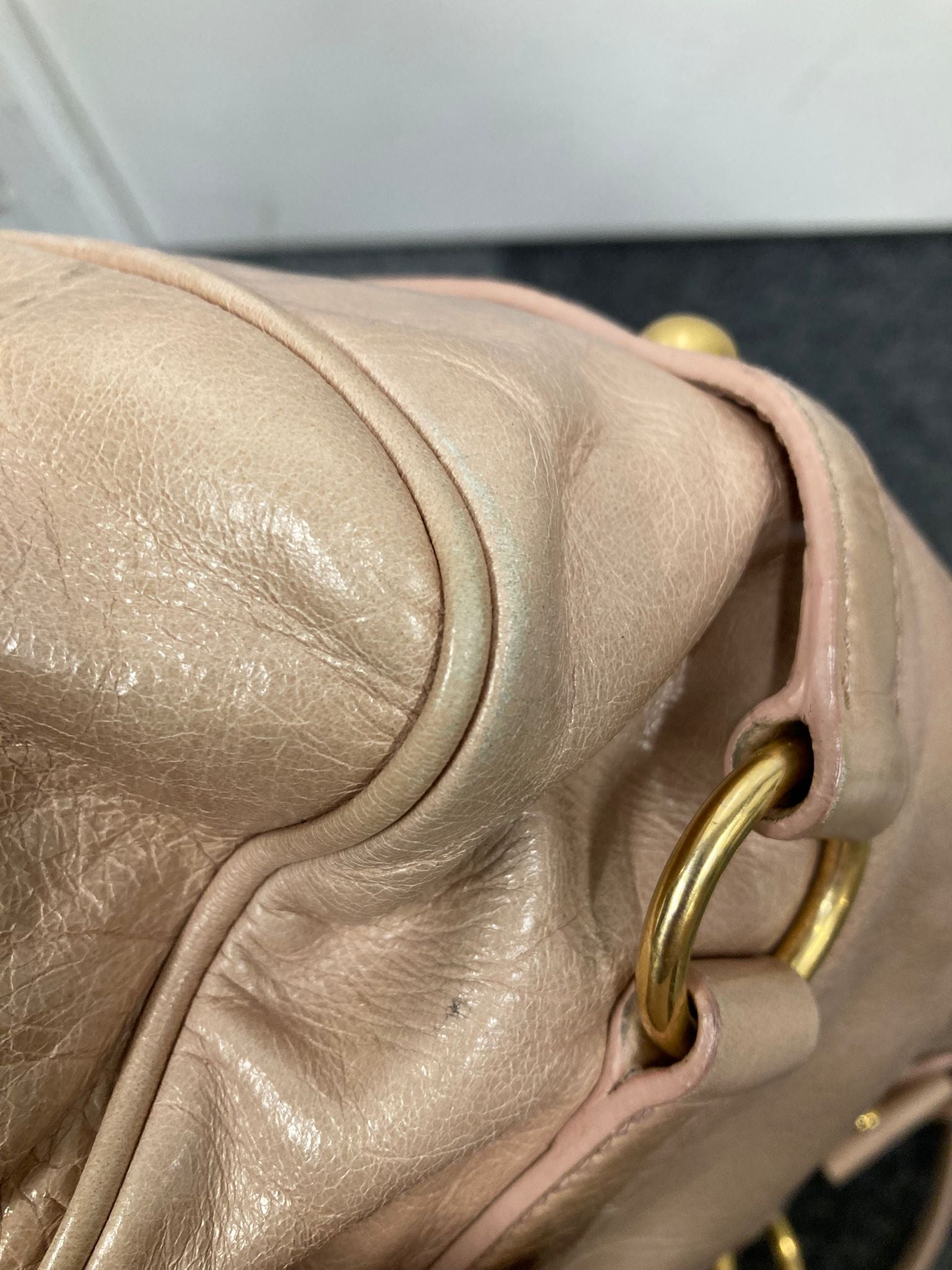 Miu Miu Vitello small rosa claro con bandolera