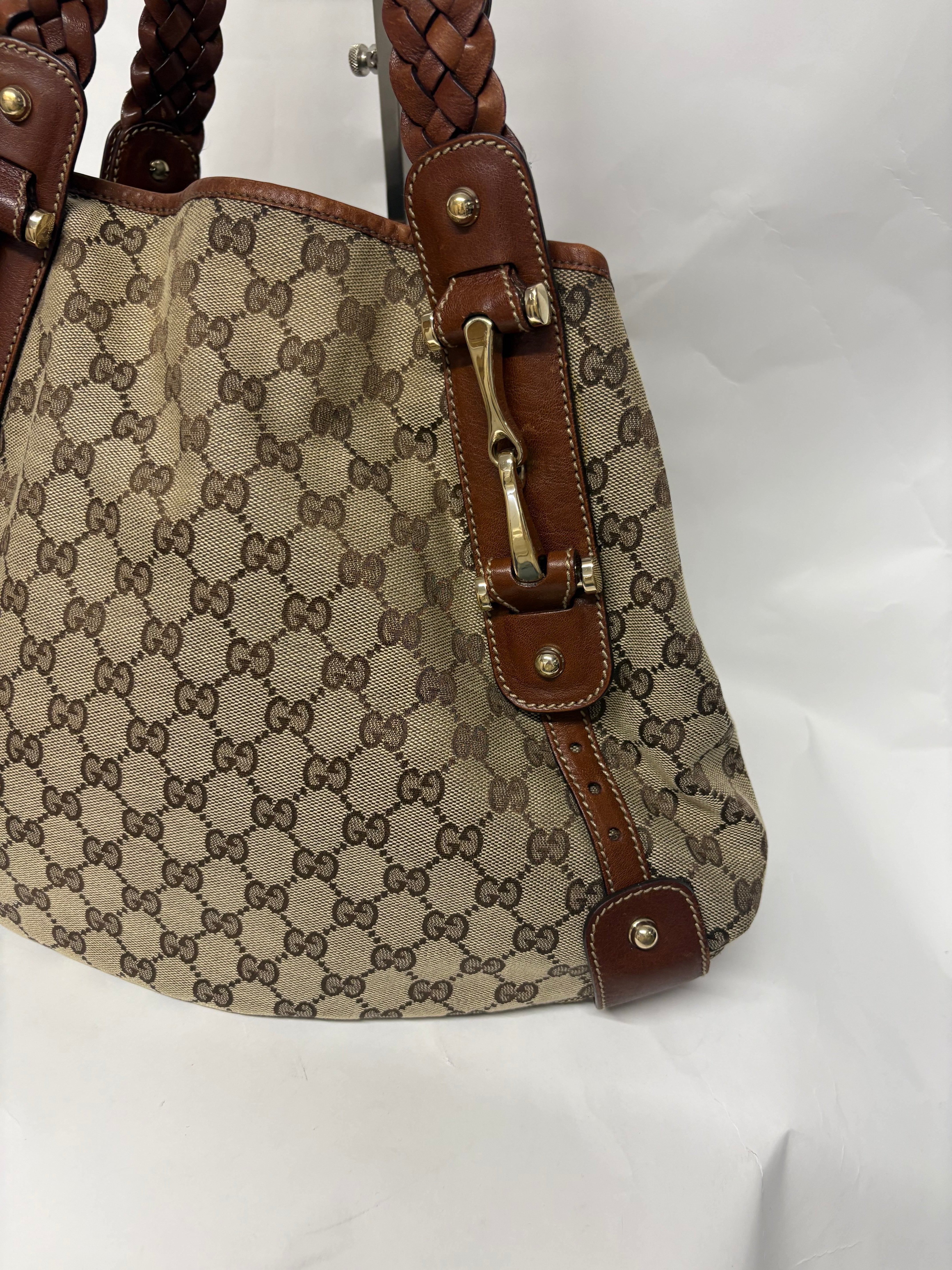 Gucci Pelham clásico en lona GG beige con piel marrón y asas trenzadas mediano