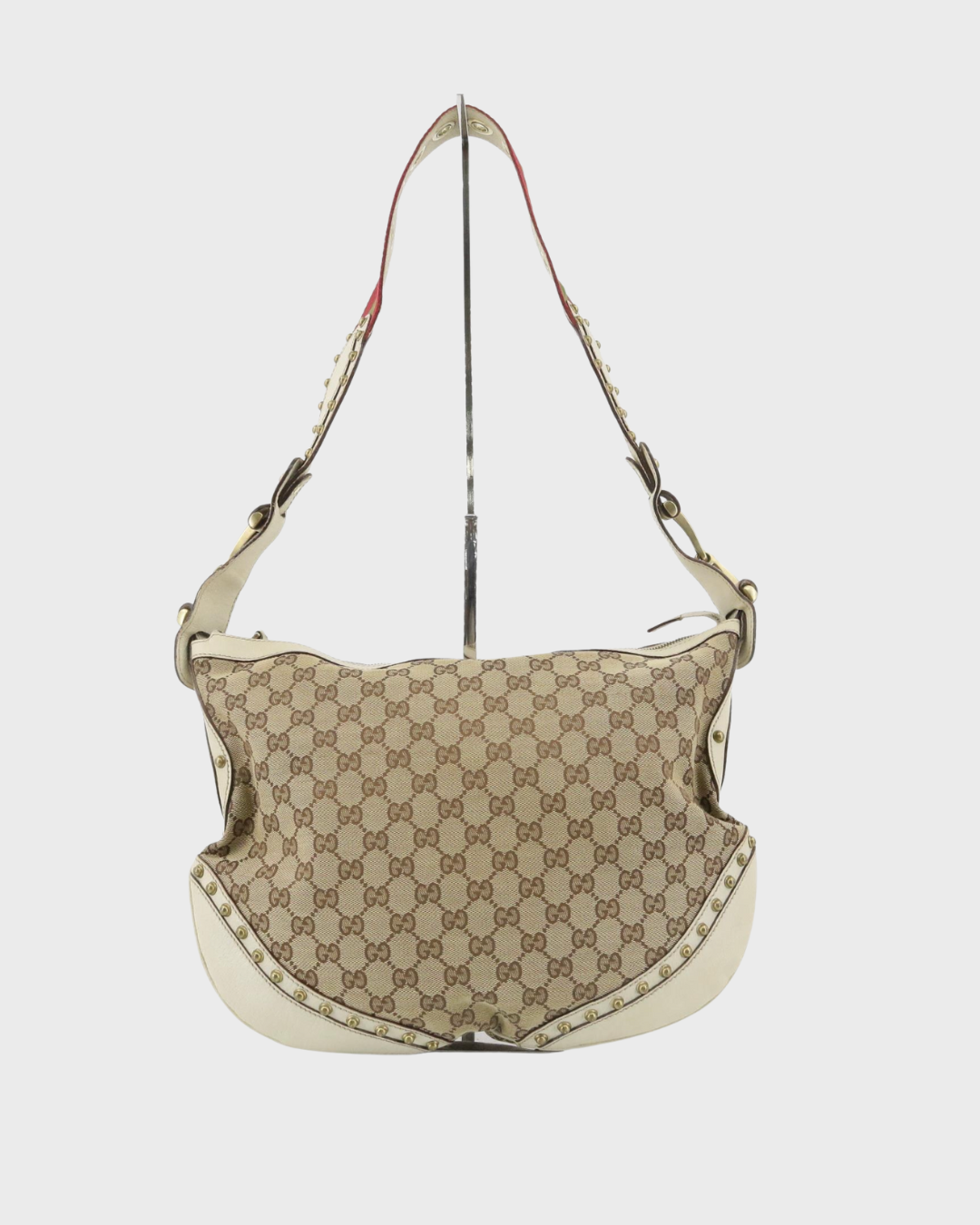 Gucci Pelham GG Canvas con tachuelas, piel blanca y bandolera